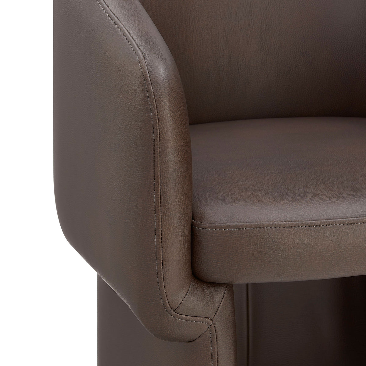 Soft vegan leather upholstery and tailored stitching along the arm and seat of the chair || EEI-7383-ESP || detail_studio