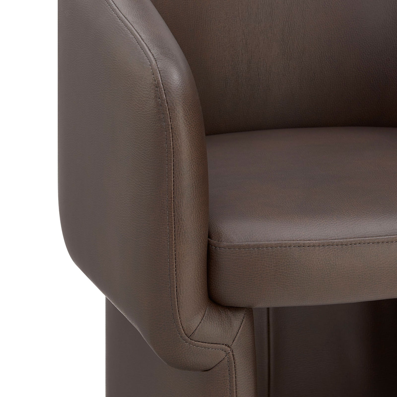 Soft vegan leather upholstery and tailored stitching along the arm and seat of the chair || EEI-7383-ESP || detail_studio
