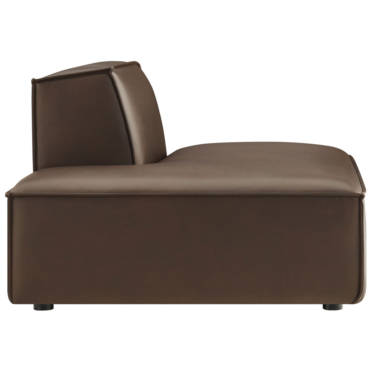 Streamlined left-facing profile with wide lounge seat and supportive back in vegan leather. || EEI-7387-ESP || side_studio