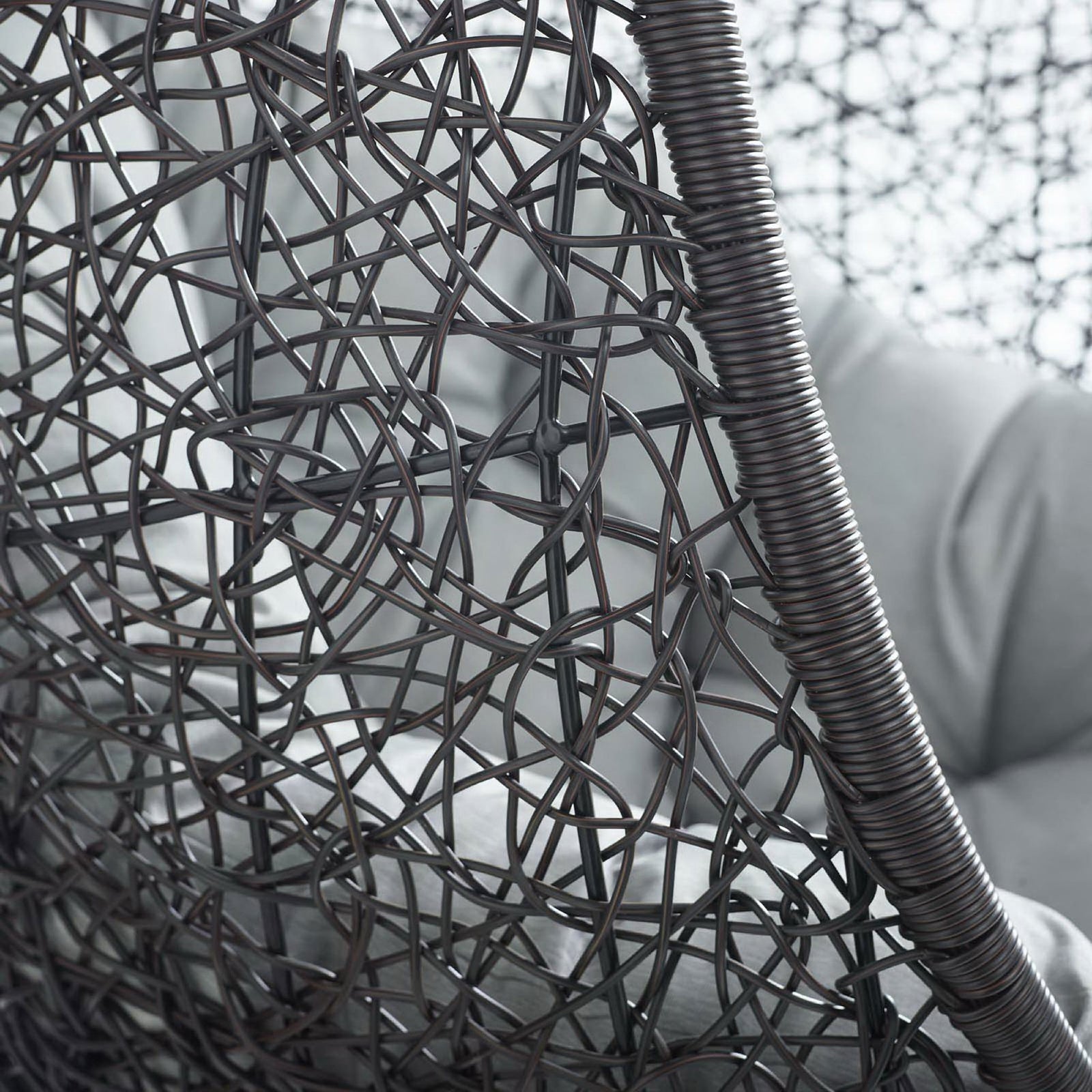 Gray cushion and espresso rattan frame show off the refined detailing of the Encase swing chair || EEI-739-GRY-SET || detail_studio