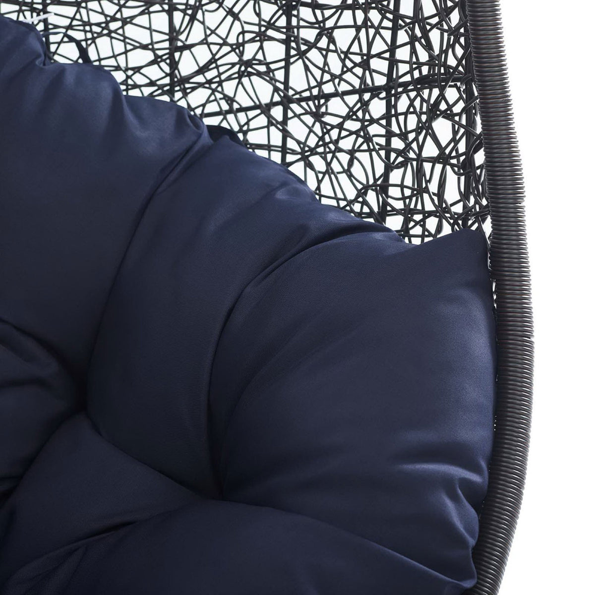 Rich navy cushion fabric and tufting showcase the softness of this outdoor swing chair || EEI-739-NAV-SET || detail_studio