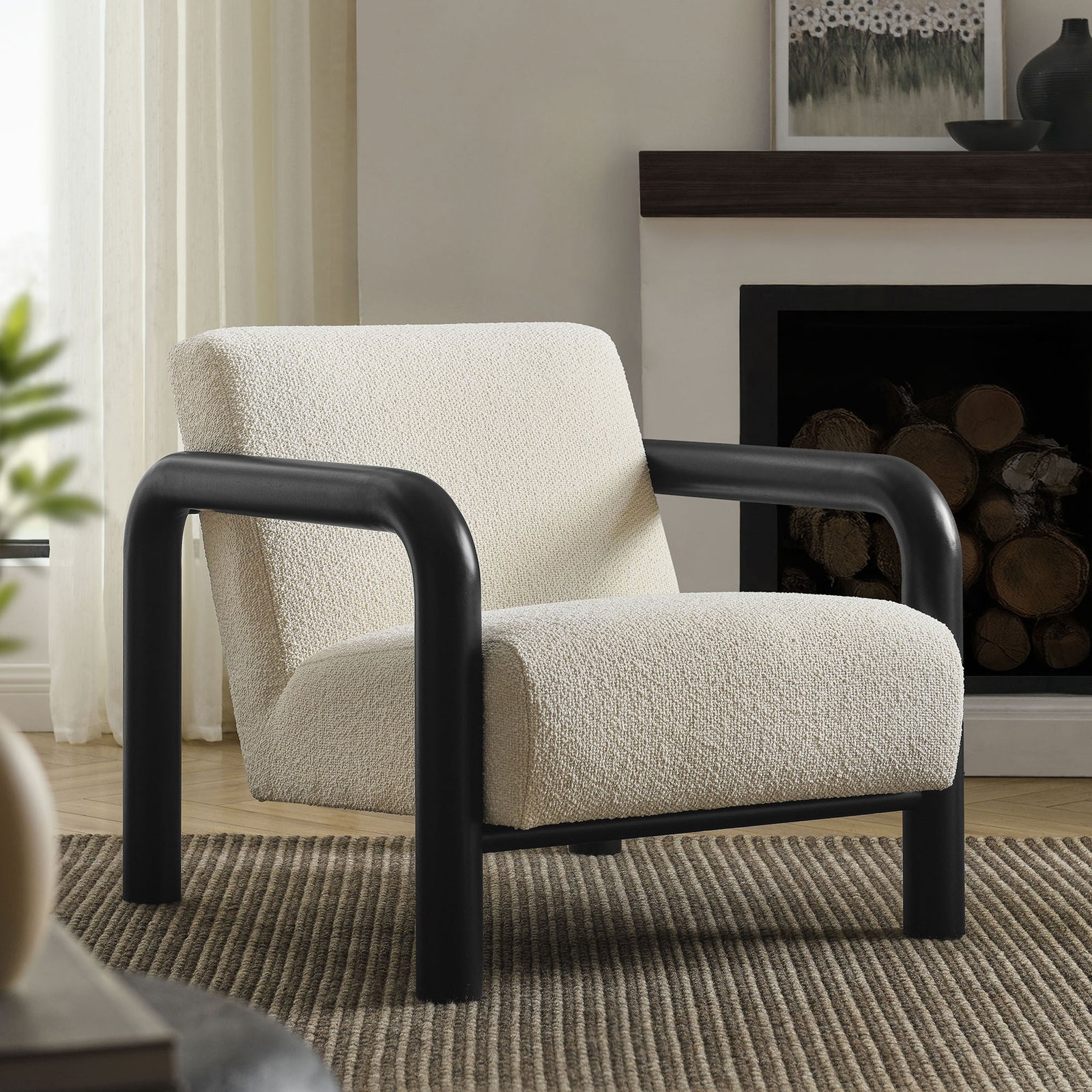 Plush cream boucle pairs with bold black arms to elevate living rooms with sculptural comfort || EEI-7391-CRE-BLK || front_angle_room