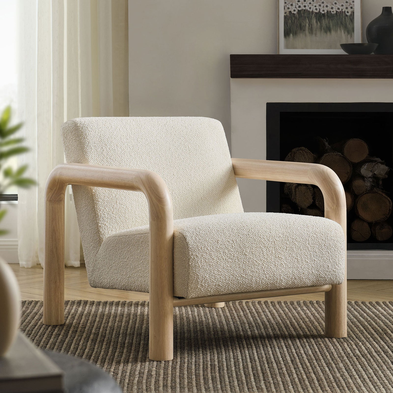 Inviting cream boucle lounge chair with rounded solid wood arms, ideal for cozy reading nooks || EEI-7391-CRE-OAK || front_angle_room