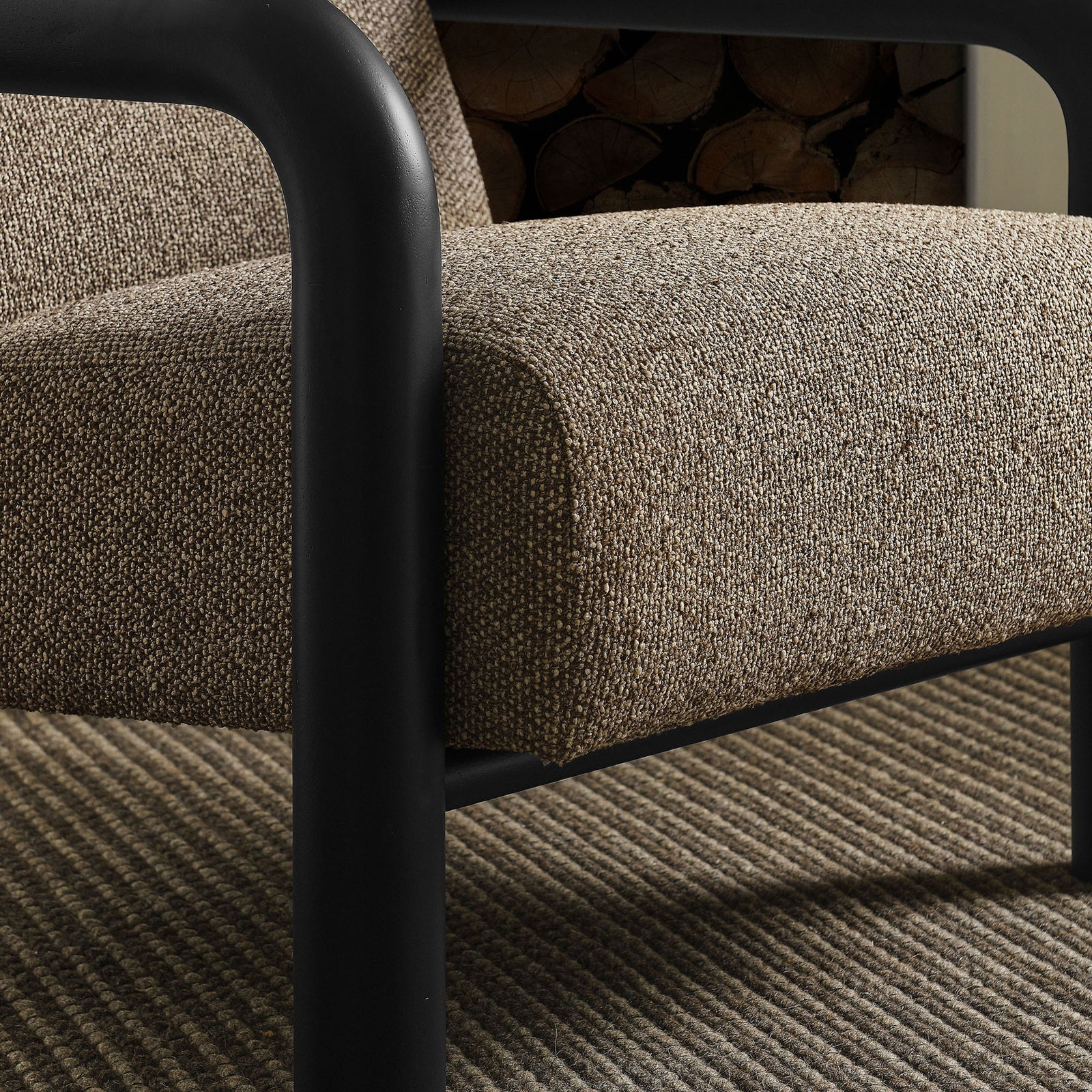 Textured earth boucle and matte black wood arm add warmth and depth to cozy spaces || EEI-7391-ETH-BLK || detail_room