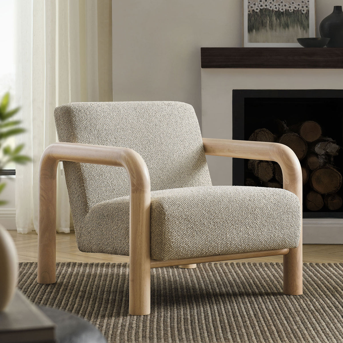Modern accent chair with rounded wood arms and plush boucle upholstery anchors a cozy living room || EEI-7391-MRB-OAK || front_angle_room