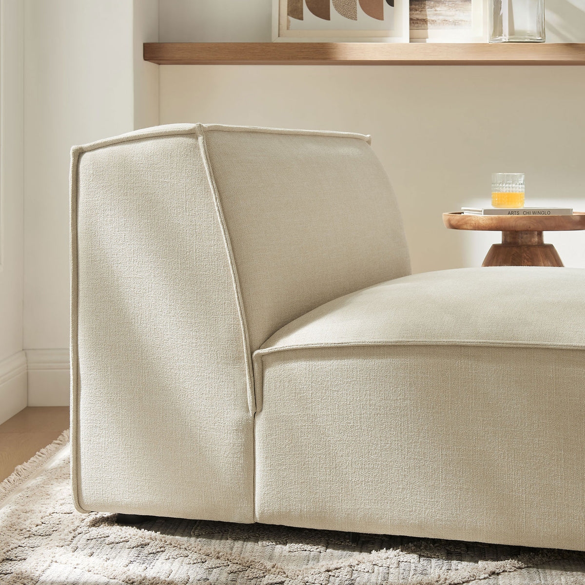 Textured ecru upholstery and a relaxed, low-slung silhouette suit modern, serene spaces || EEI-7395-ECR || detail_room