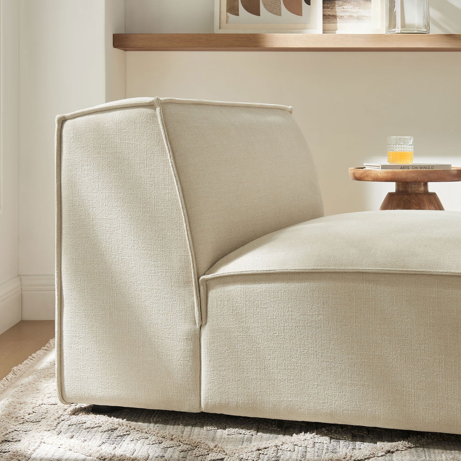 Textured ecru upholstery and a relaxed, low-slung silhouette suit modern, serene spaces || EEI-7395-ECR || detail_room