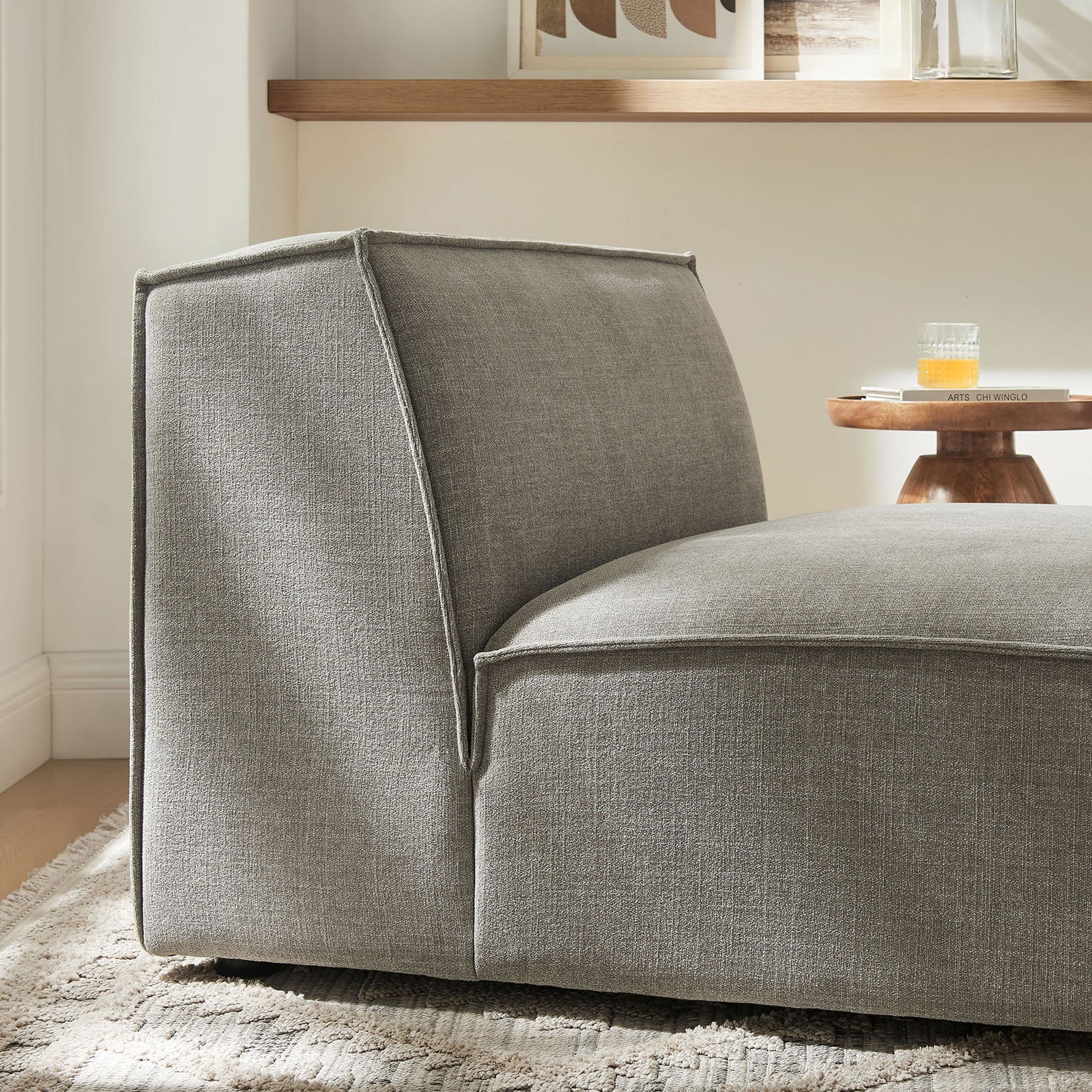 Tonal pewter upholstery pairs with crisp piping for a modern, easy-to-clean finish || EEI-7395-PEW || detail_room