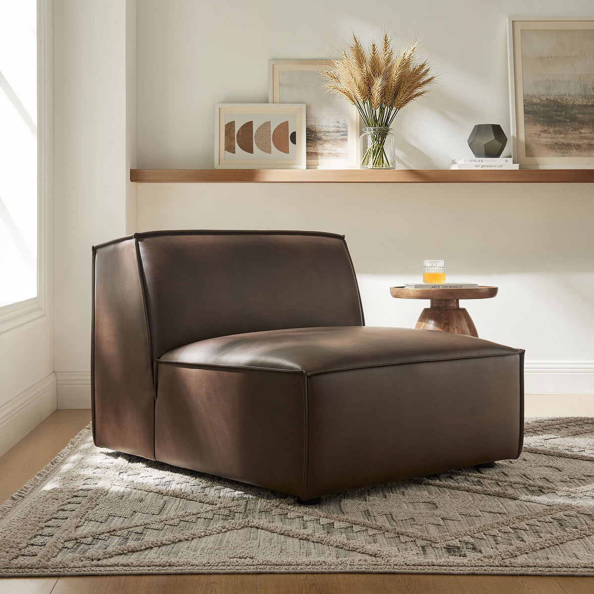 Modern modular chair elevates the living room with deep seating and luxe vegan leather || EEI-7396-ESP || front_angle_room