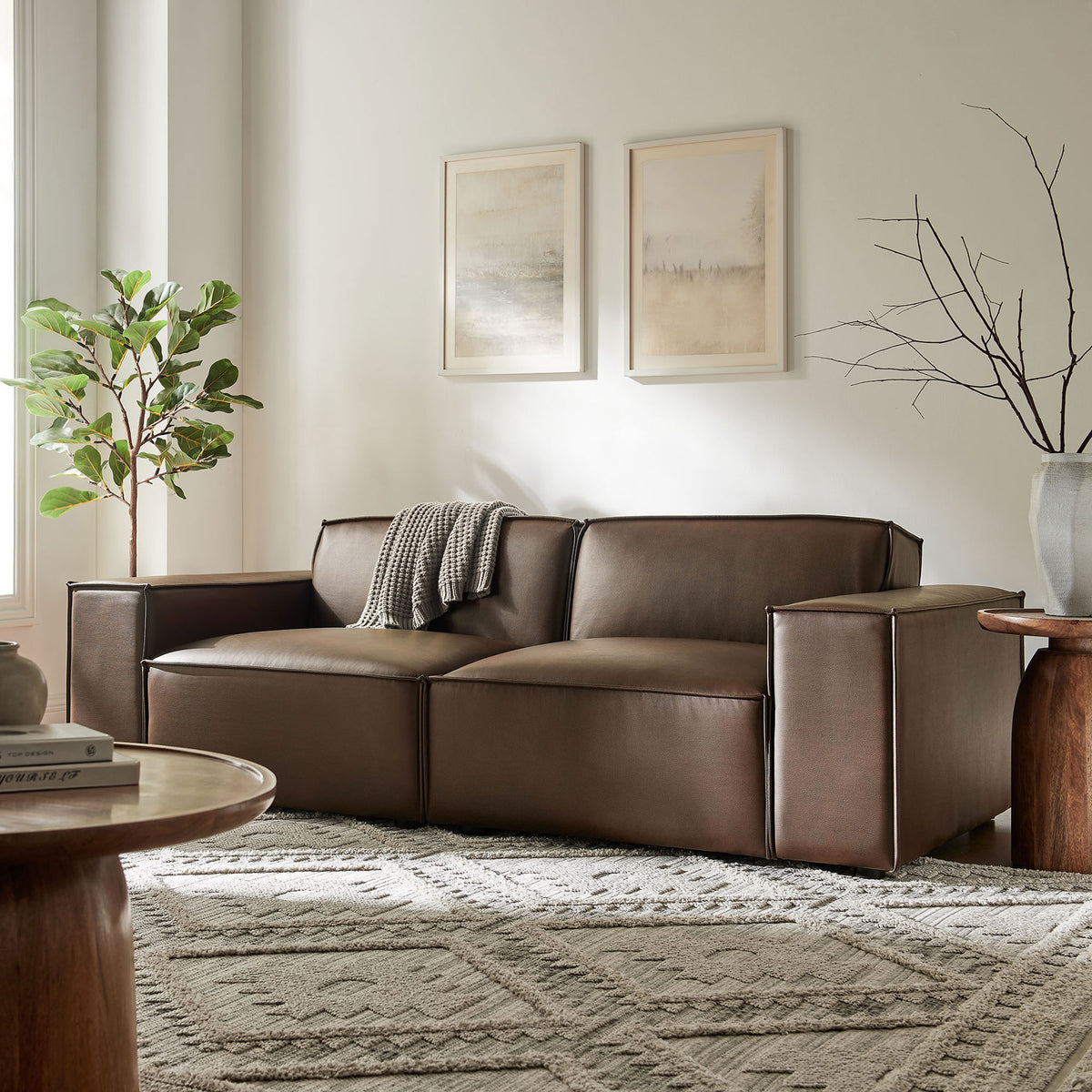 Espresso vegan leather loveseat anchoring a bright living room with soft neutral decor. || EEI-7404-ESP || front_room