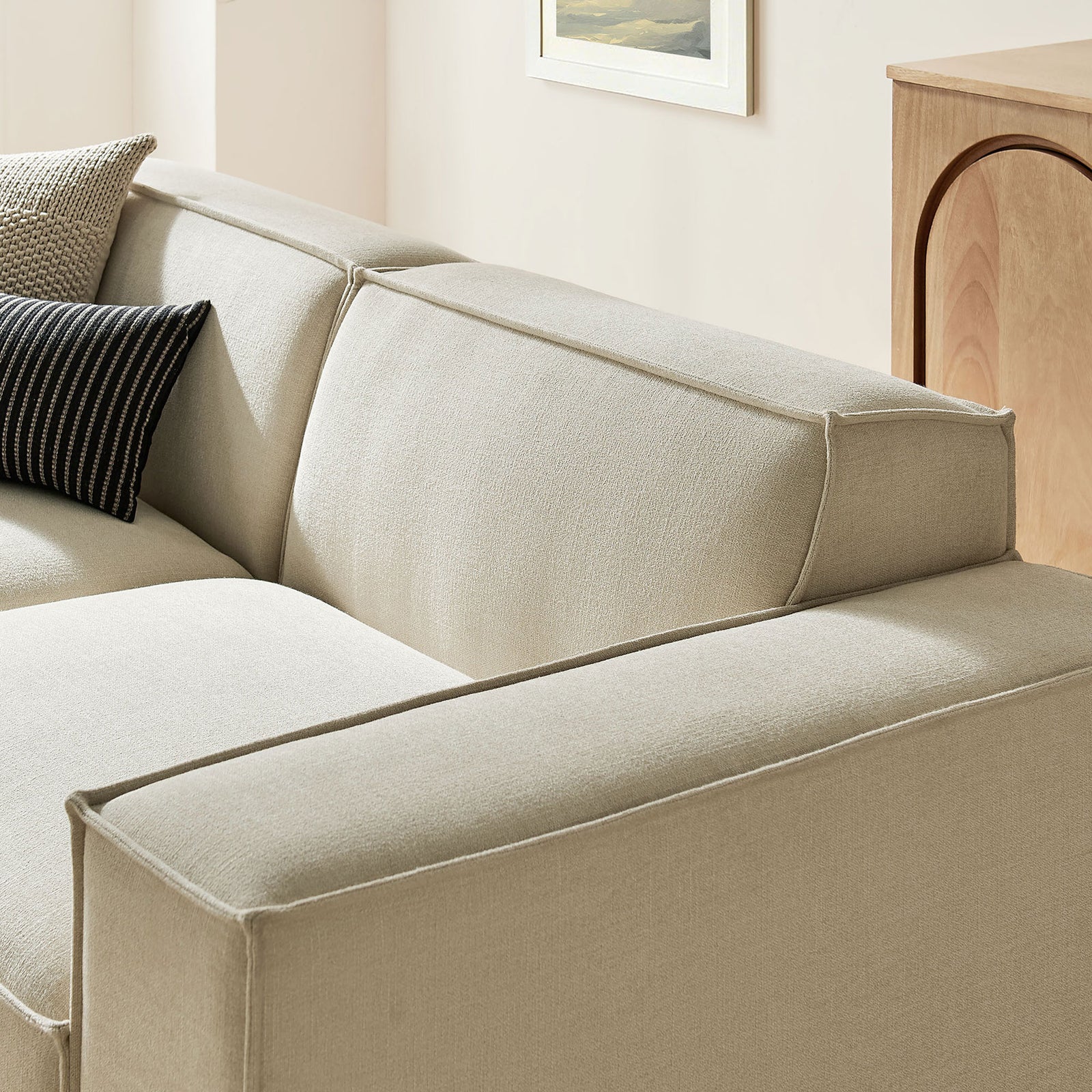 Textured Restore ecru performance fabric highlighting soft feel and tailored French piping. || EEI-7405-ECR || detail_room