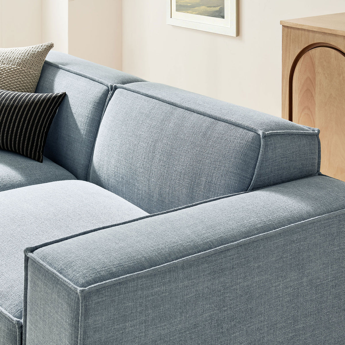 Sky blue performance fabric upholstery with French piping and a generously padded back cushion || EEI-7405-SKY || detail_room