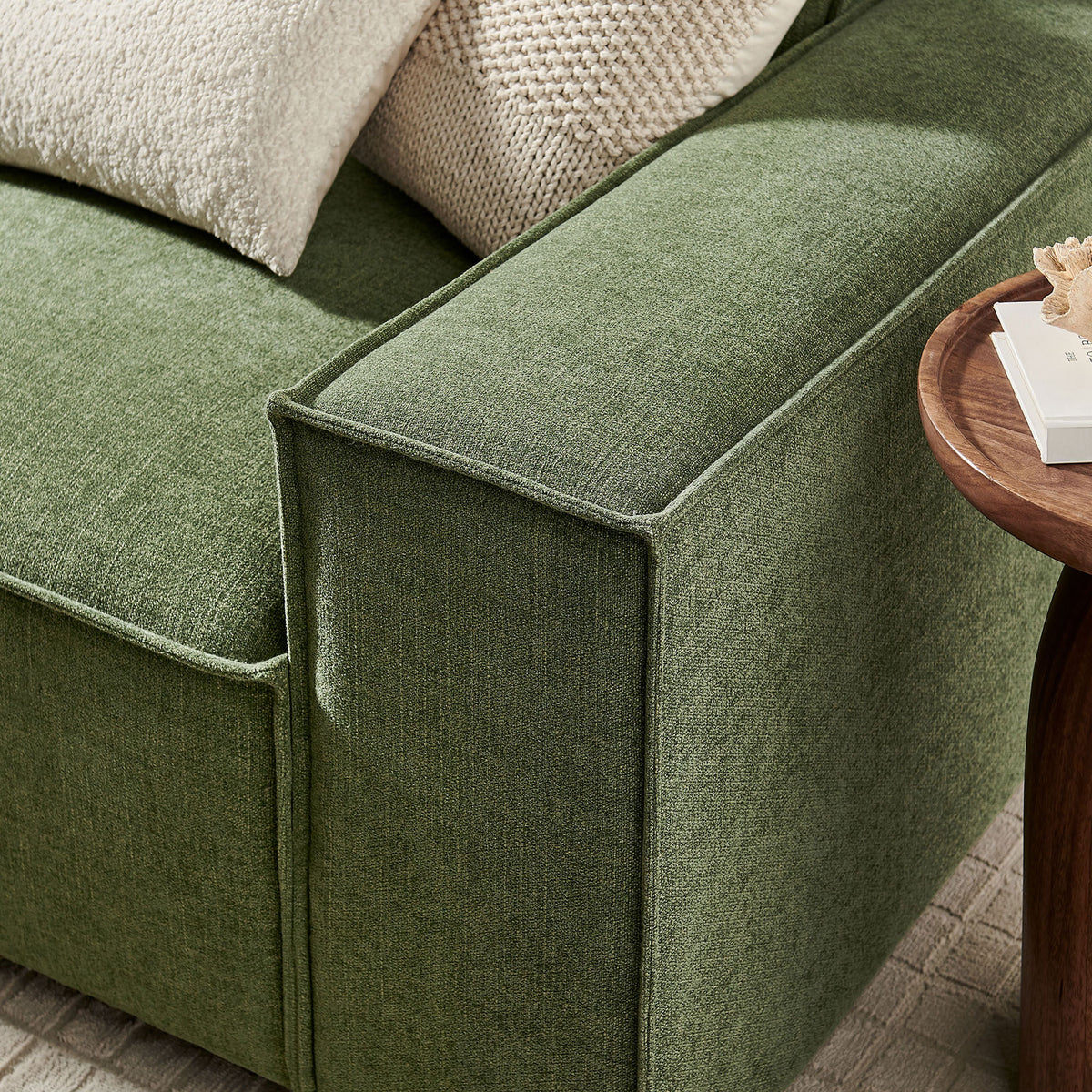 Sofa arm showcasing the soft woven green performance fabric and subtle piping trim || EEI-7407-FOL || detail_room