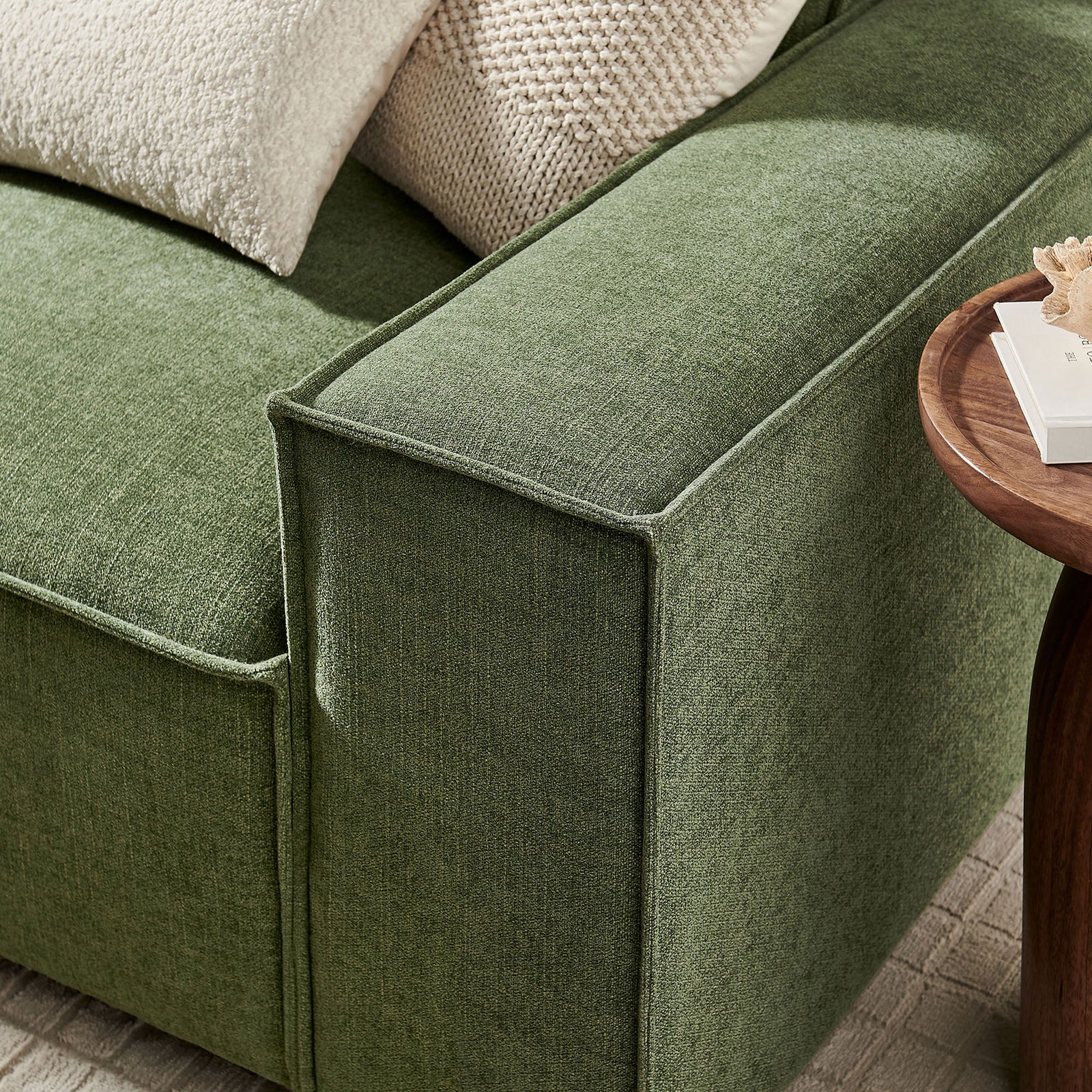Sofa arm showcasing the soft woven green performance fabric and subtle piping trim || EEI-7407-FOL || detail_room
