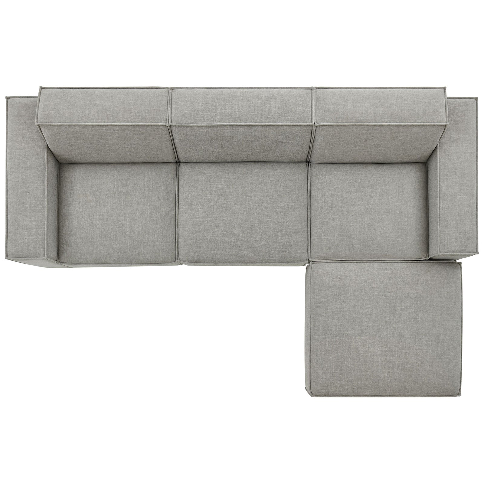 Modular sectional configured with right chaise and ottoman creating an open L-shaped layout || EEI-7409-PEW || top_studio