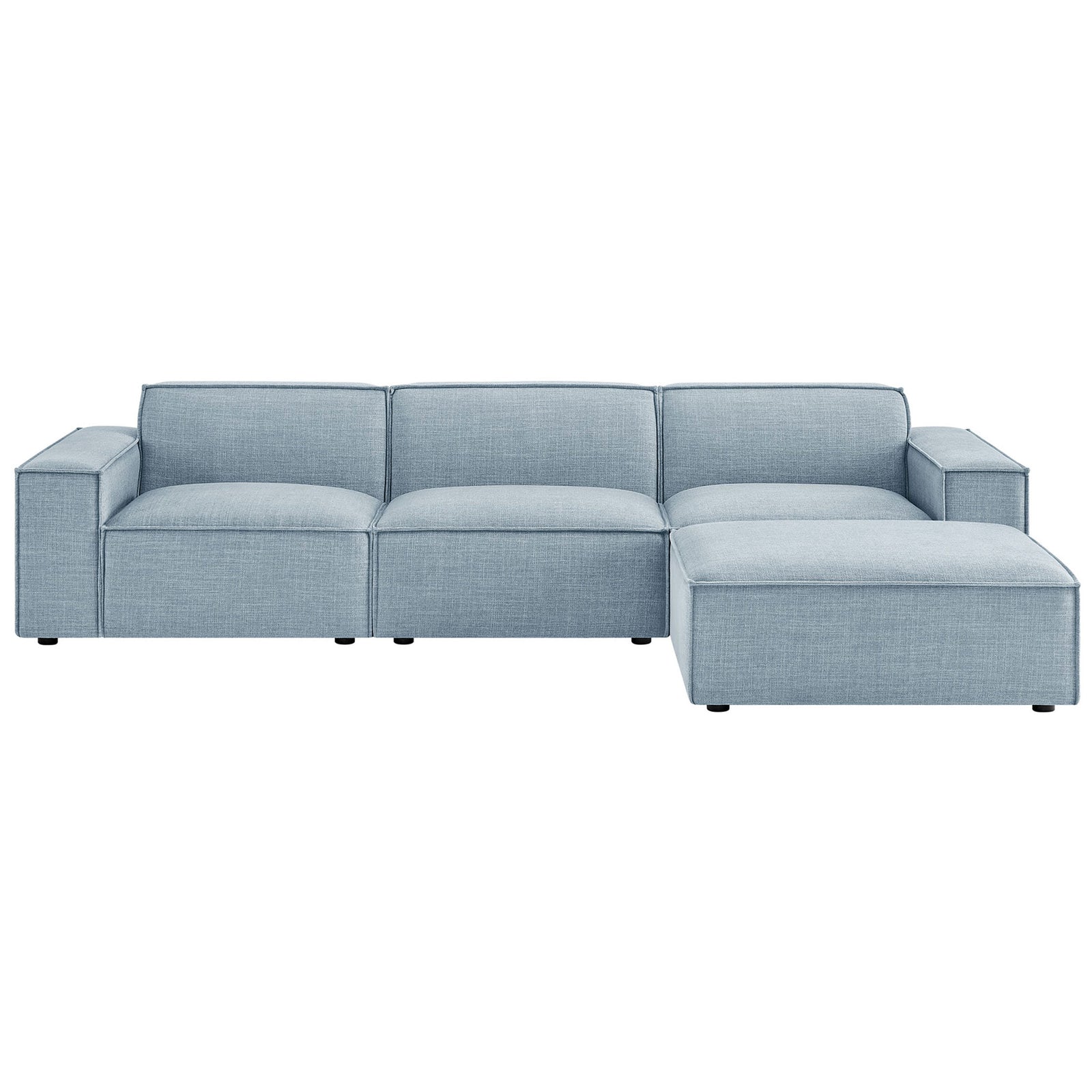 Sky blue modular sectional with ottoman and deep cushions for relaxed modern lounging || EEI-7409-SKY || front_studio