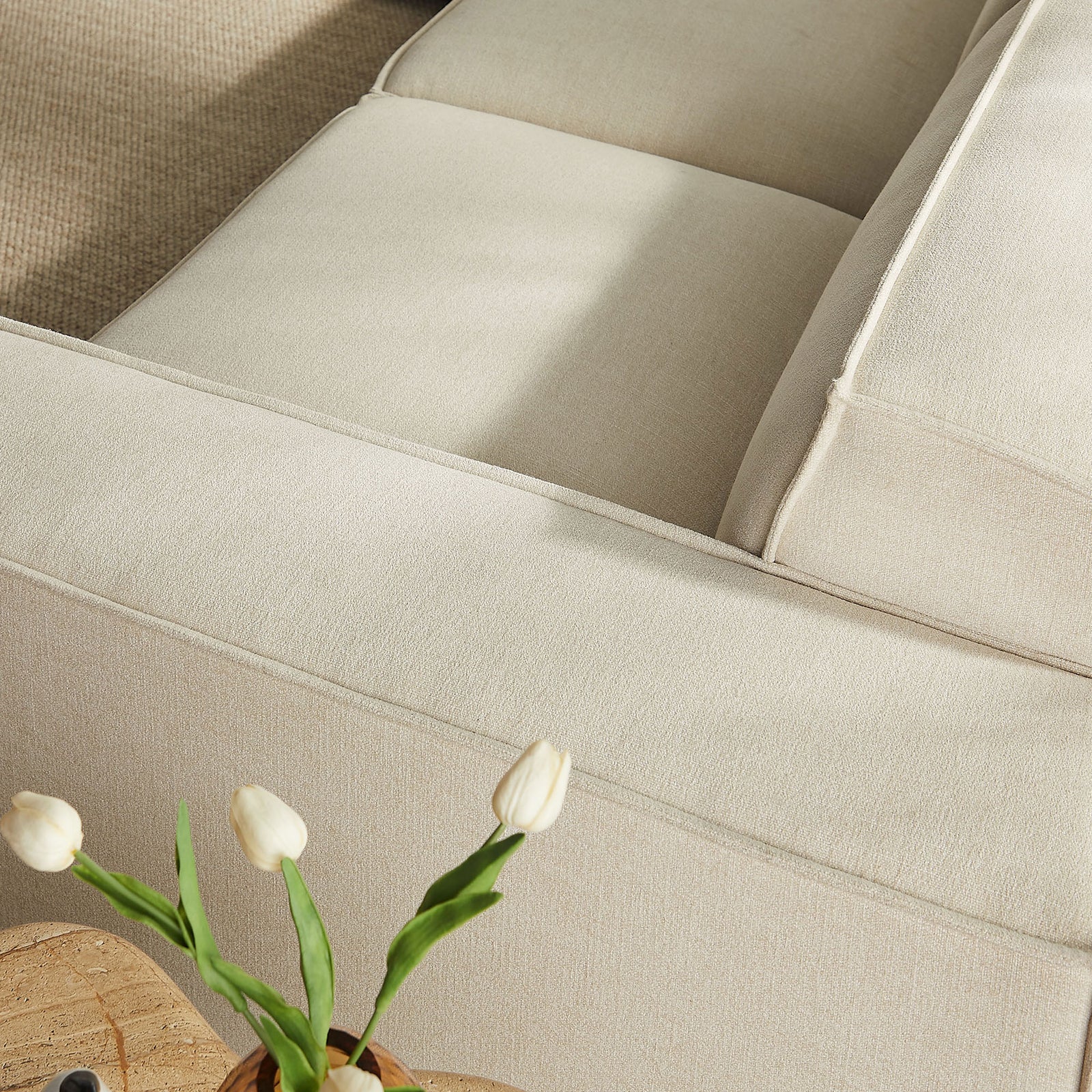 Close-up of the ecru performance fabric and French piping for a soft, refined texture || EEI-7411-ECR || swatch_room