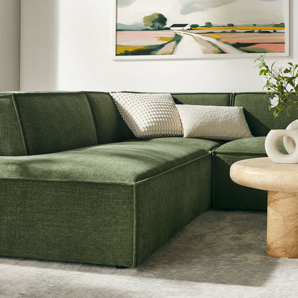 Low-profile chaise end highlights the sectional's clean lines and inviting foliage green performance fabric || EEI-7415-FOL || detail_room