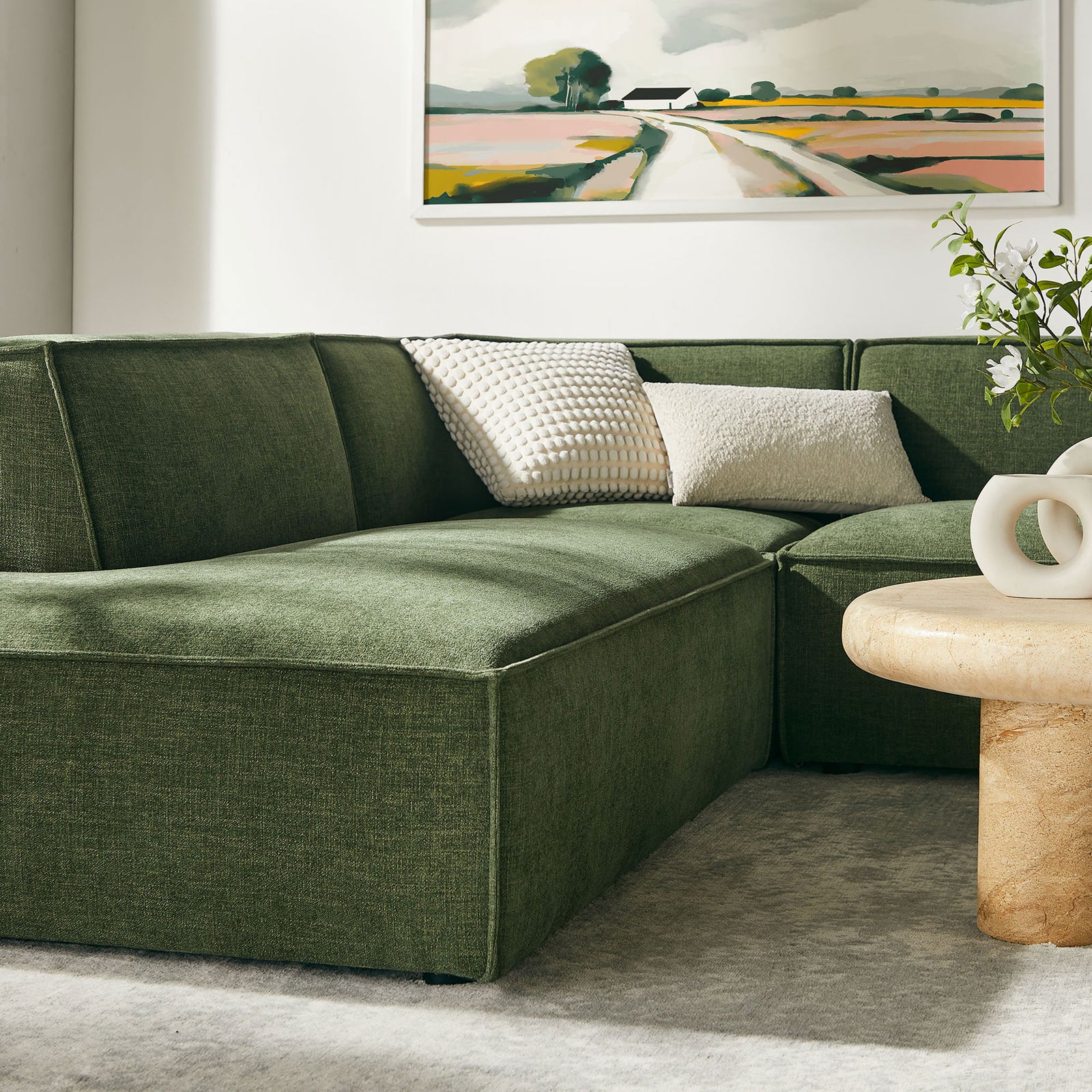 Low-profile chaise end highlights the sectional's clean lines and inviting foliage green performance fabric || EEI-7415-FOL || detail_room