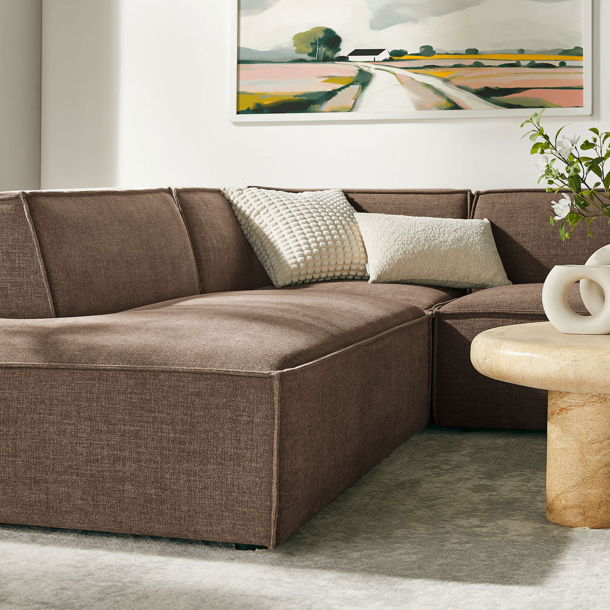 Mocha chaise end invites lounging on plush performance upholstery in modern decor. || EEI-7415-MOC || detail_room