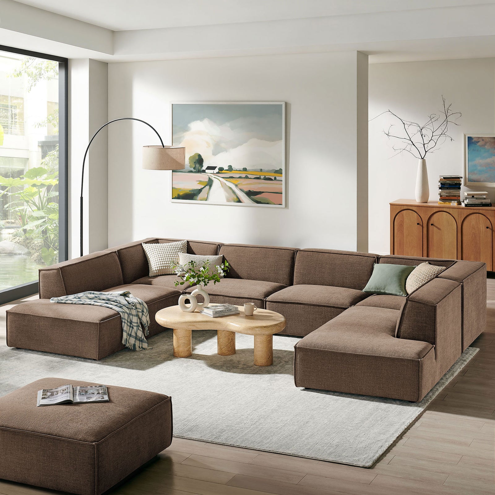 Restore sectional creates a cozy mocha seating hub in a bright contemporary living room. || EEI-7415-MOC || front_angle_room