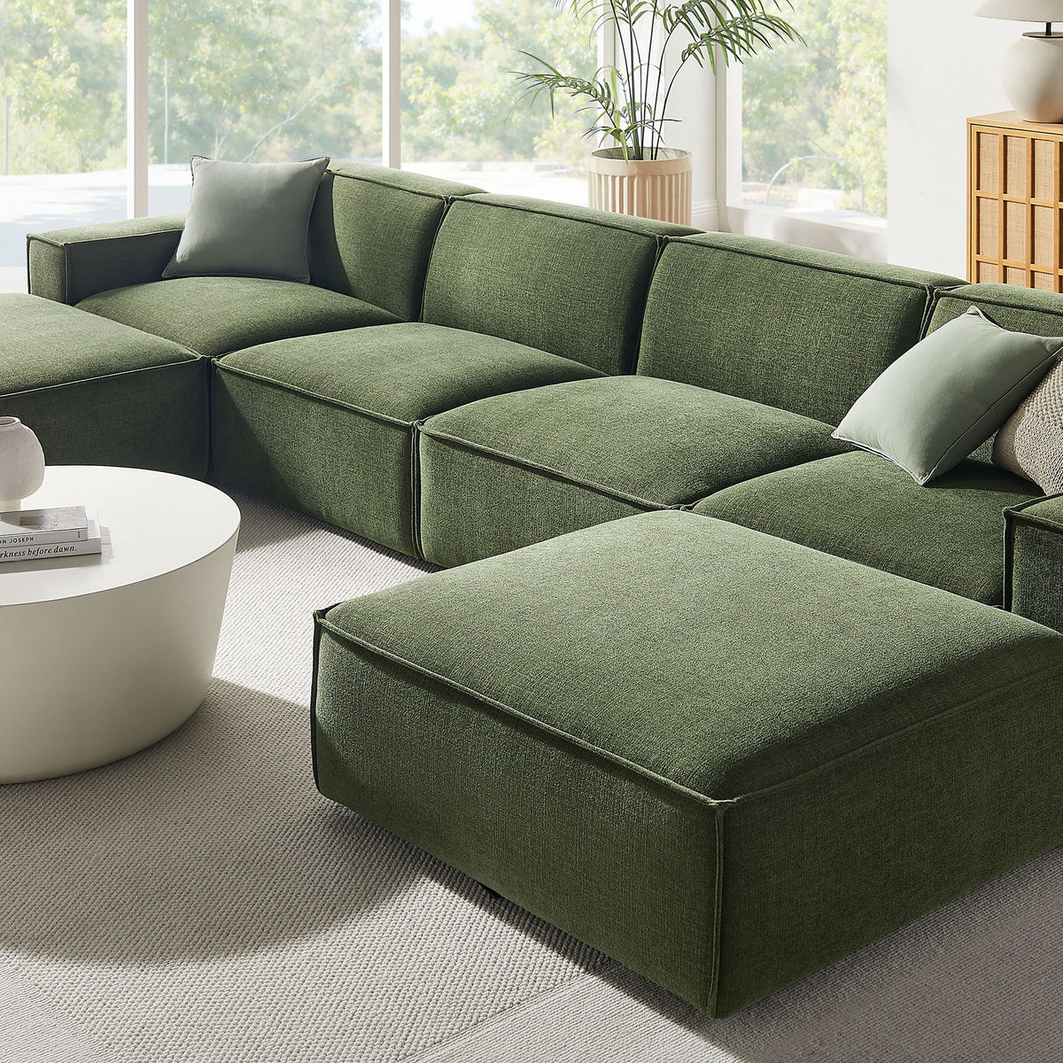 Foliage green Restore sectional and ottoman highlighting soft performance fabric and tailored French piping || EEI-7417-FOL || detail_room