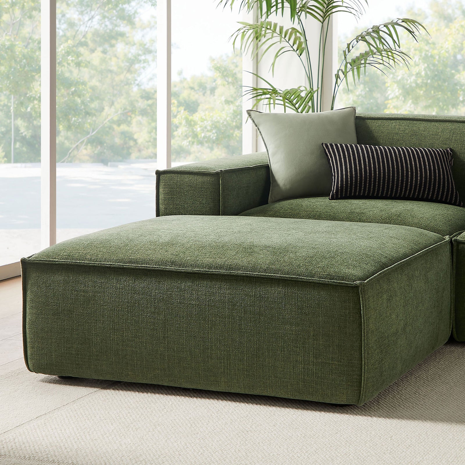Right-facing lounge seat in foliage green upholstery with wide cushion and relaxed, low-back comfort || EEI-7417-FOL || detail_room