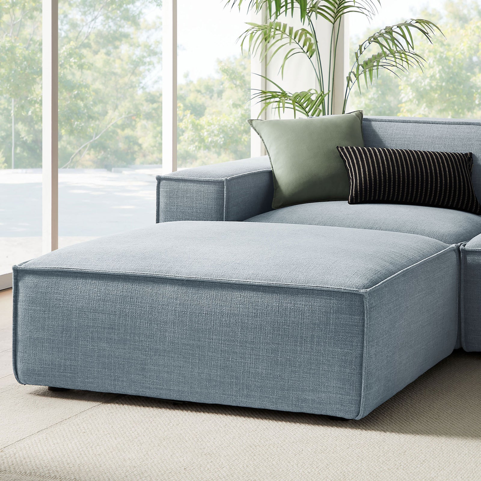 Sky blue chaise lounge seat with track arm, plush cushion, and layered accent pillows || EEI-7417-SKY || detail_room
