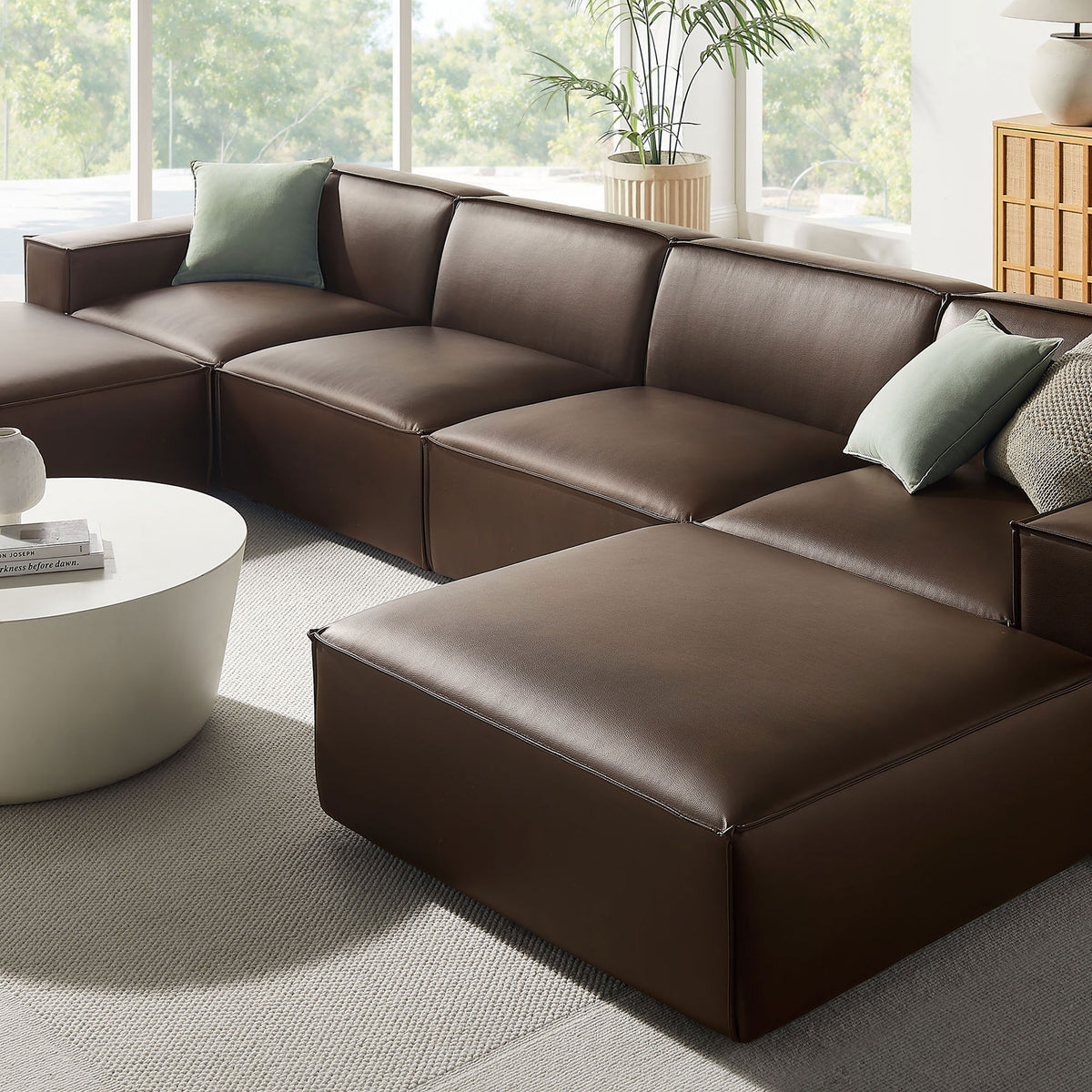 Espresso vegan leather sectional showcasing smooth upholstery and generously padded seats || EEI-7418-ESP || detail_room