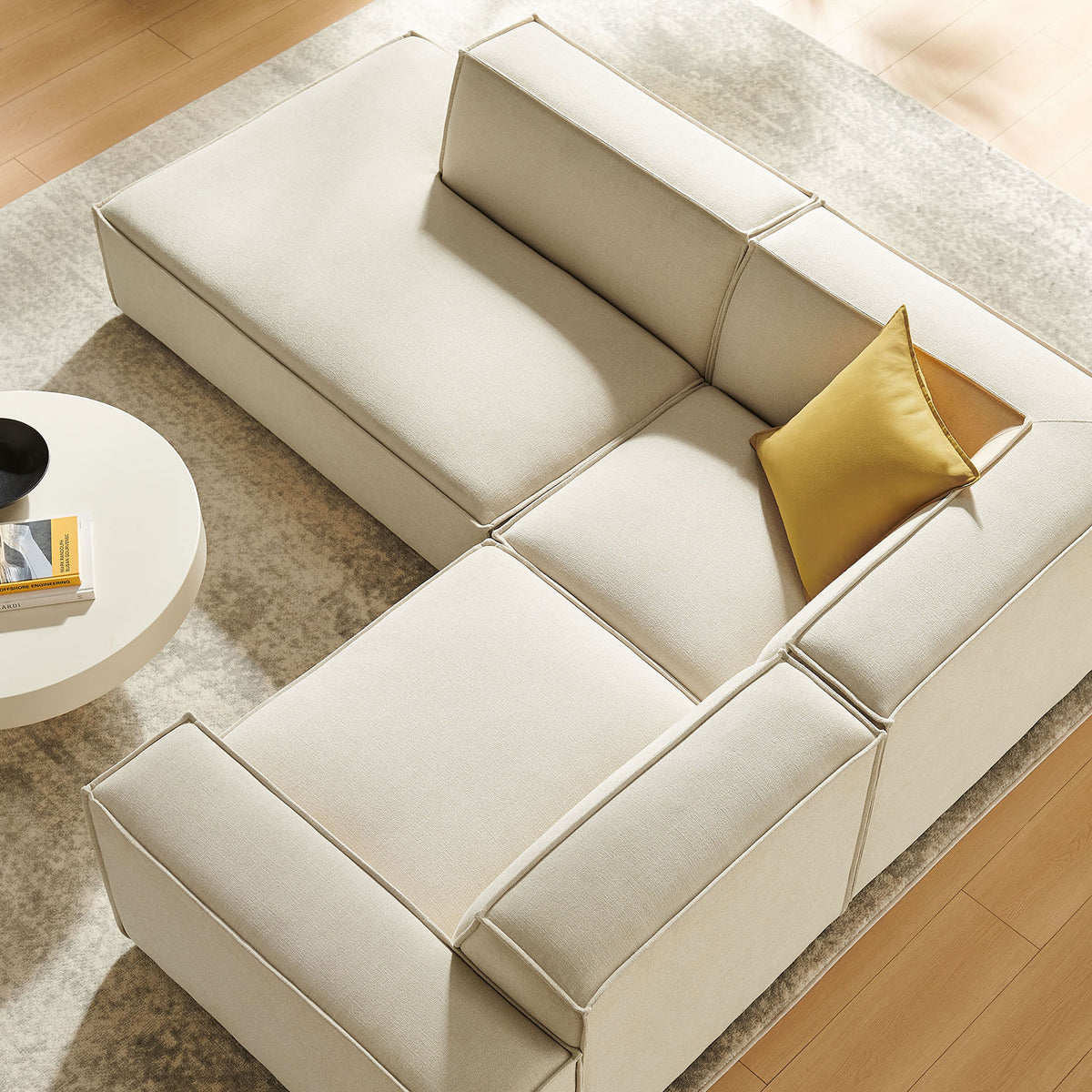 Room view of the modular sectional highlighting deep cushions, wraparound seating, and cozy styling || EEI-7419-ECR || top_angle_room