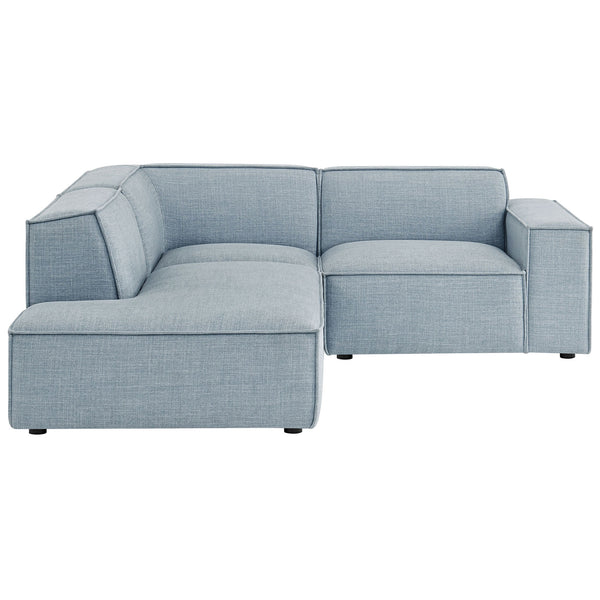 Compact modular sectional with broad track arms and supportive sky blue performance fabric upholstery || EEI-7419-SKY || front_studio