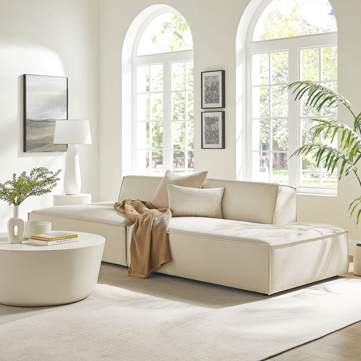 Restore modular loveseat in ecru performance fabric anchoring an airy living room with contemporary style || EEI-7423-ECR || front_angle_room