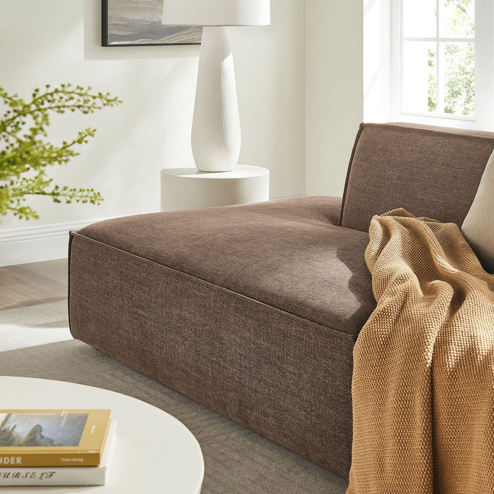 Mocha chaise lounge seat styled with a cozy throw blanket in a bright, inviting living room || EEI-7423-MOC || detail_room
