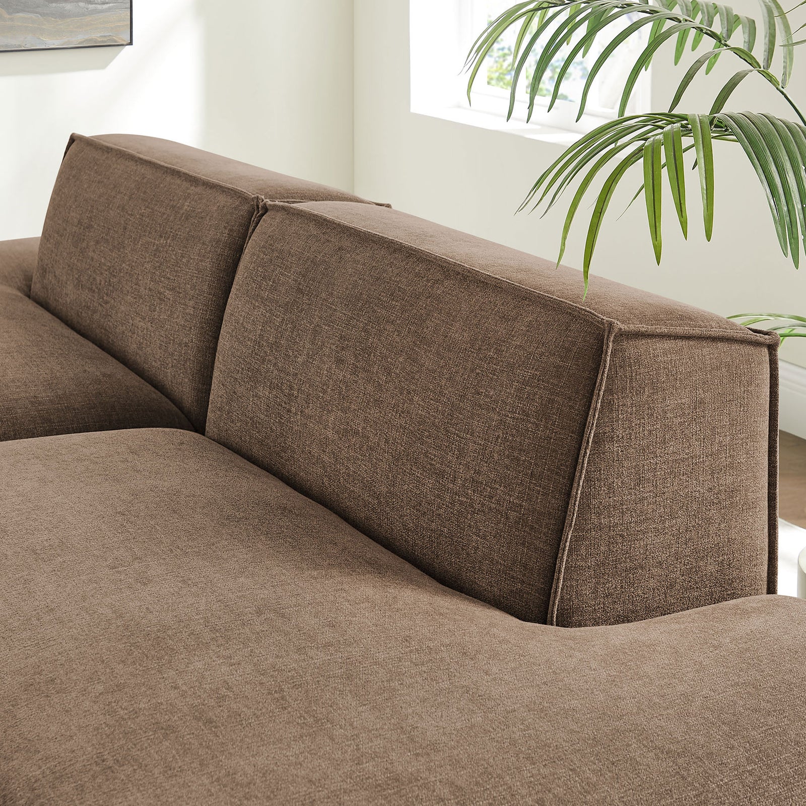 Angled backrest cushions with tailored French piping on the mocha performance fabric modular loveseat || EEI-7423-MOC || detail_room