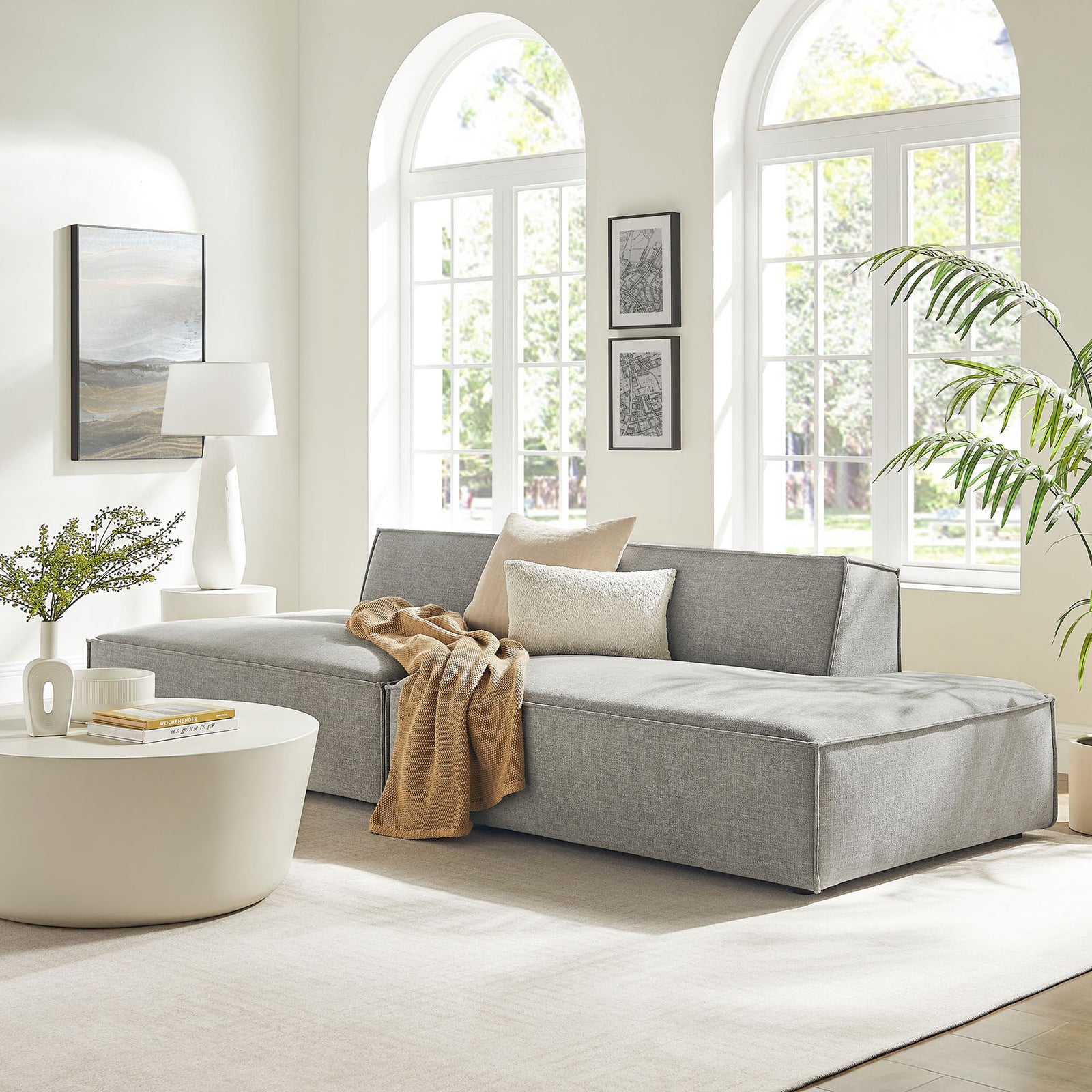 Pewter modular loveseat creating a relaxed lounge centerpiece in a sunlit contemporary living room || EEI-7423-PEW || front_angle_room