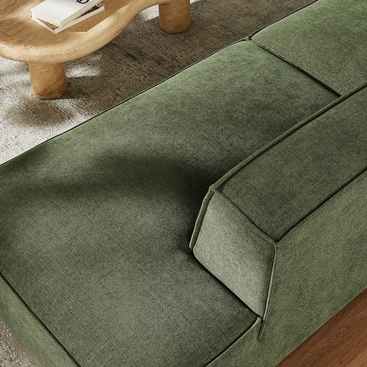 Plush chaise seat in foliage green fabric with smooth tailoring and inviting lounge-ready profile || EEI-7425-FOL || detail_room
