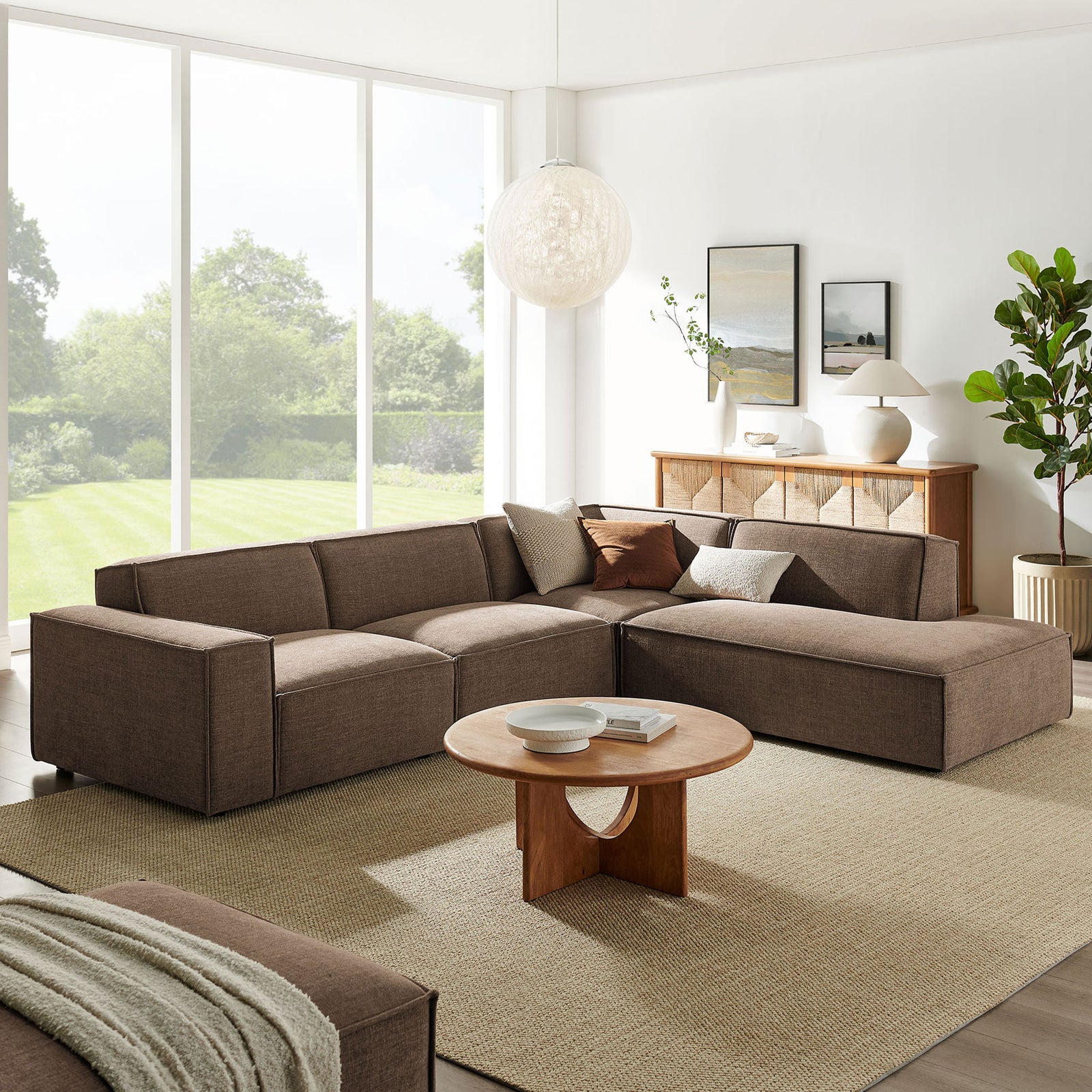 Right chaise sectional in mocha pairs with light decor for an inviting contemporary lounge || EEI-7429-MOC || front_angle_room
