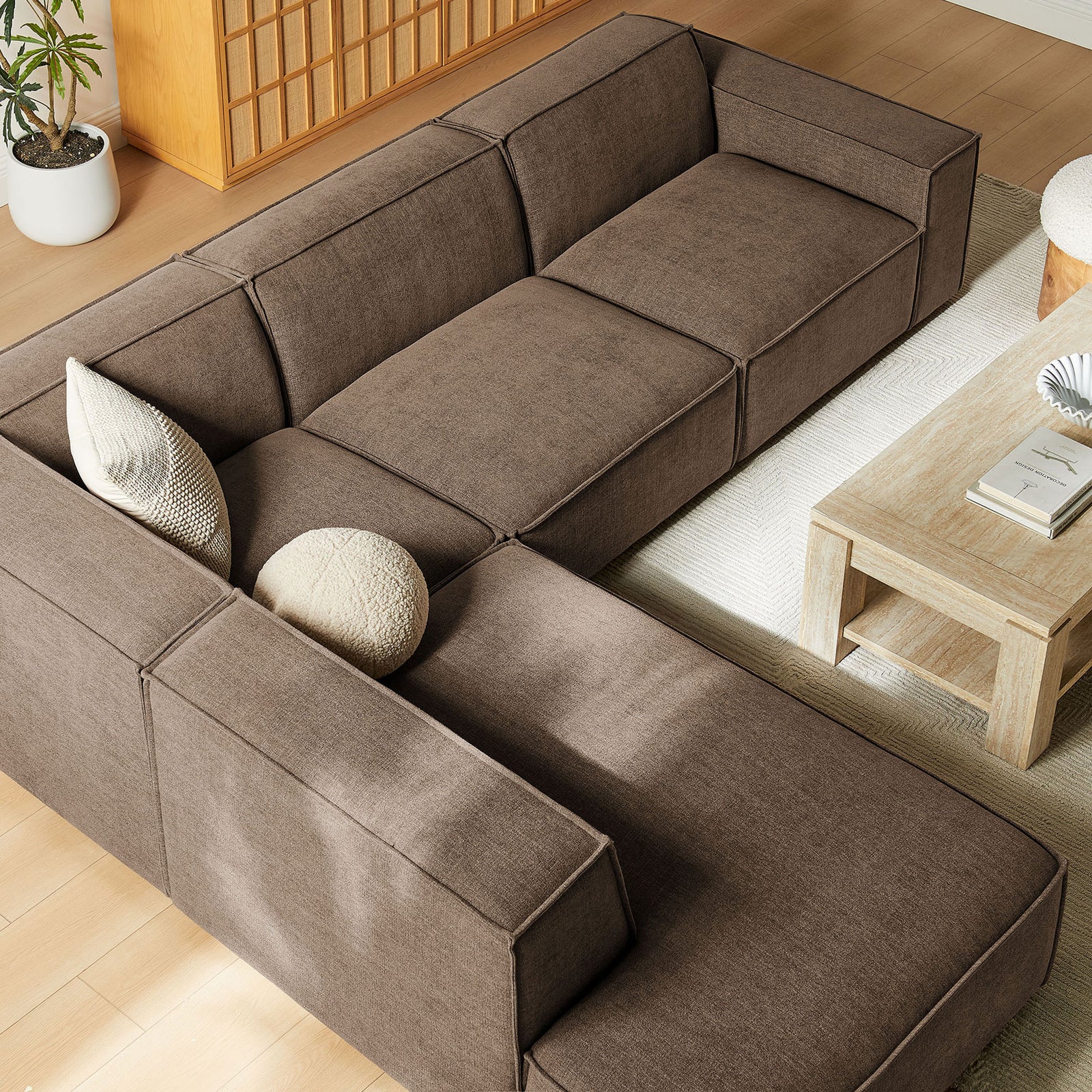 Generous modular seats invite sprawling comfort in this cozy mocha sectional layout || EEI-7431-MOC || top_angle_room