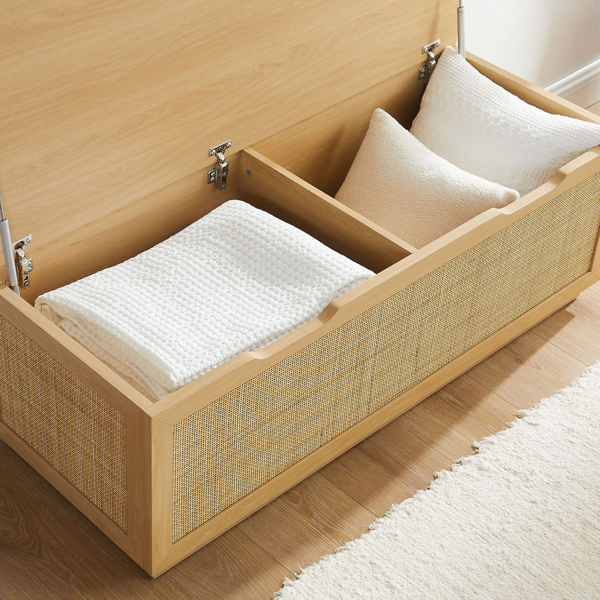Practical divided storage keeps blankets and essentials organized inside the bench || EEI-7434-OAK || storage_open_room