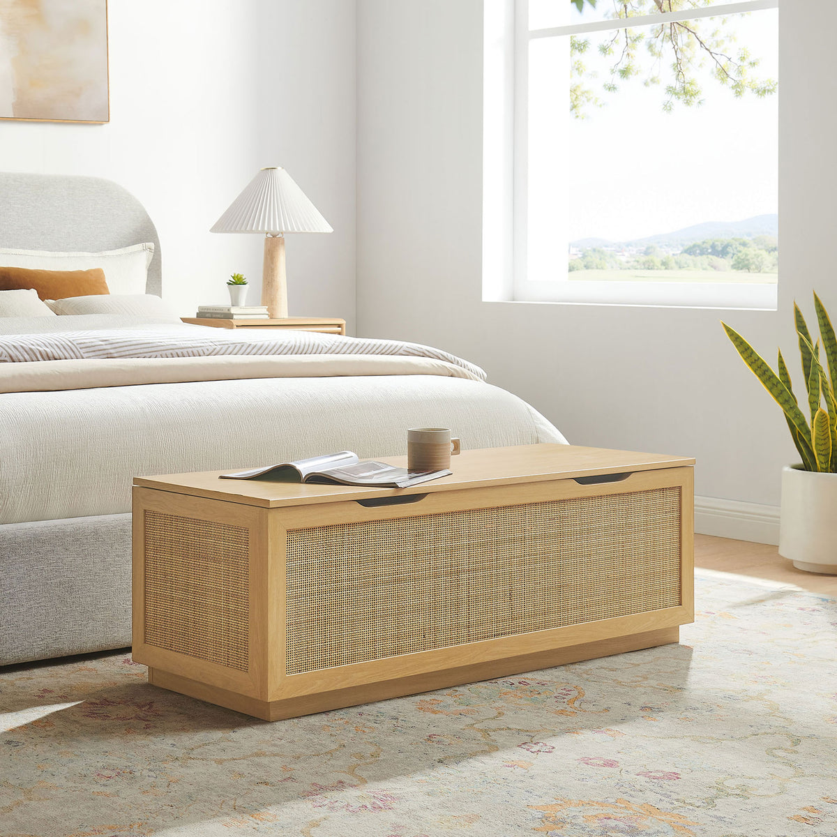 At the foot of the bed, the faux rattan-front bench offers hidden storage and relaxed style || EEI-7434-OAK || front_angle_room