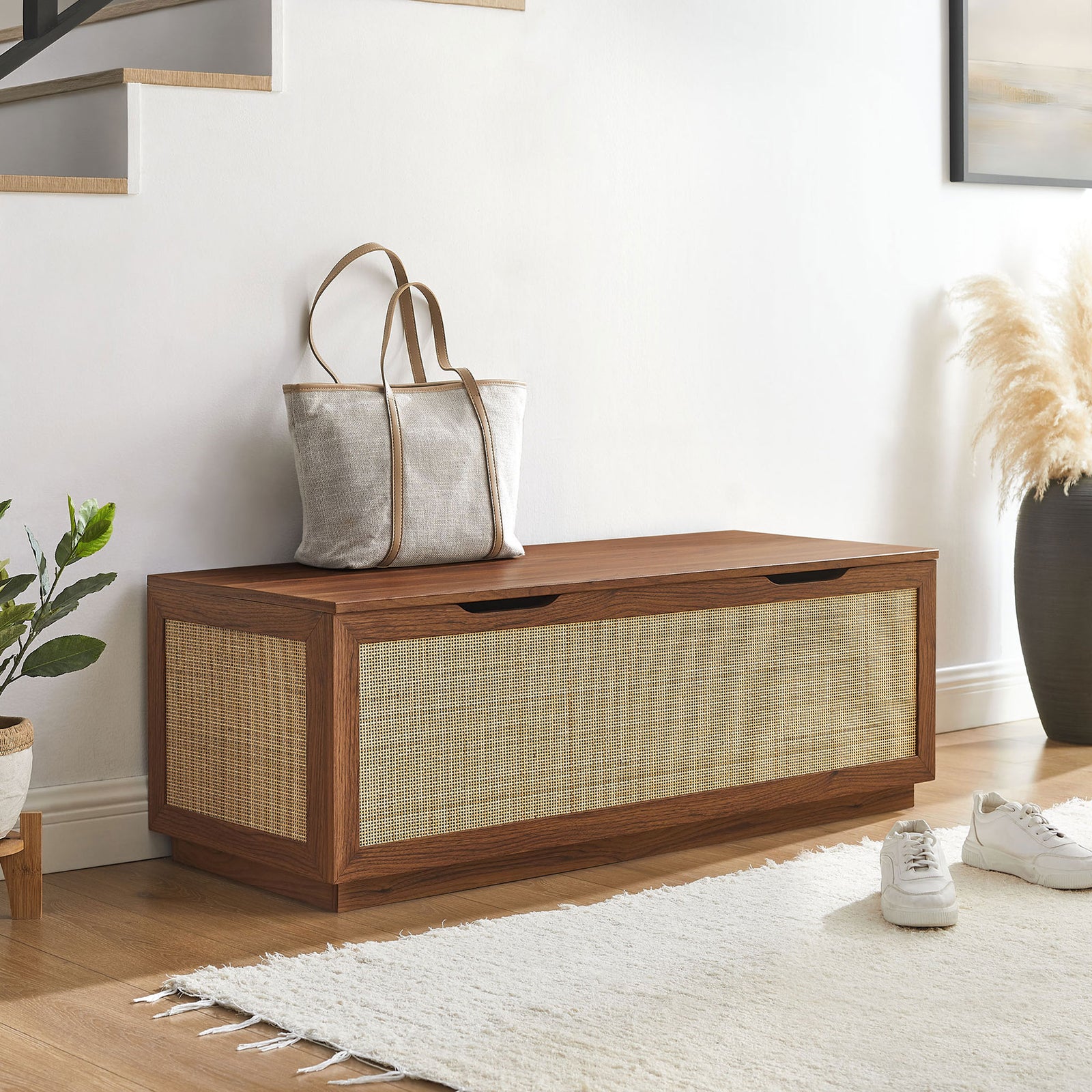 Entryway-ready storage bench in walnut and rattan, blending easily with modern decor || EEI-7434-WAL || front_angle_room