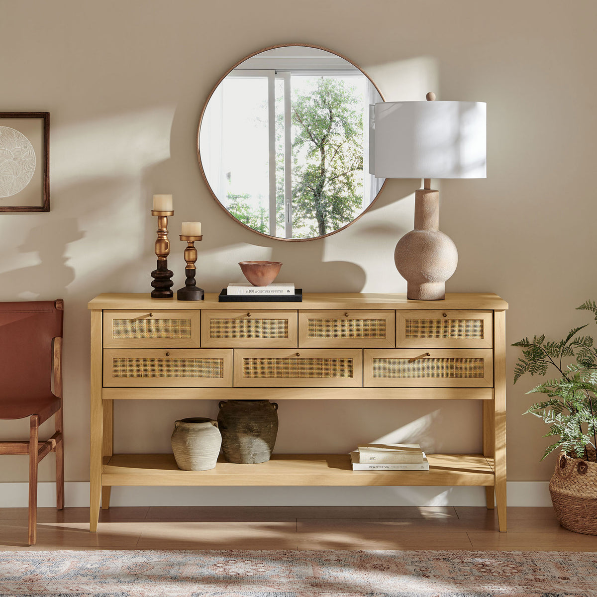 Versatile oak console elevates an entry or living room with rattan drawers and a full-length shelf || EEI-7435-OAK || front_room