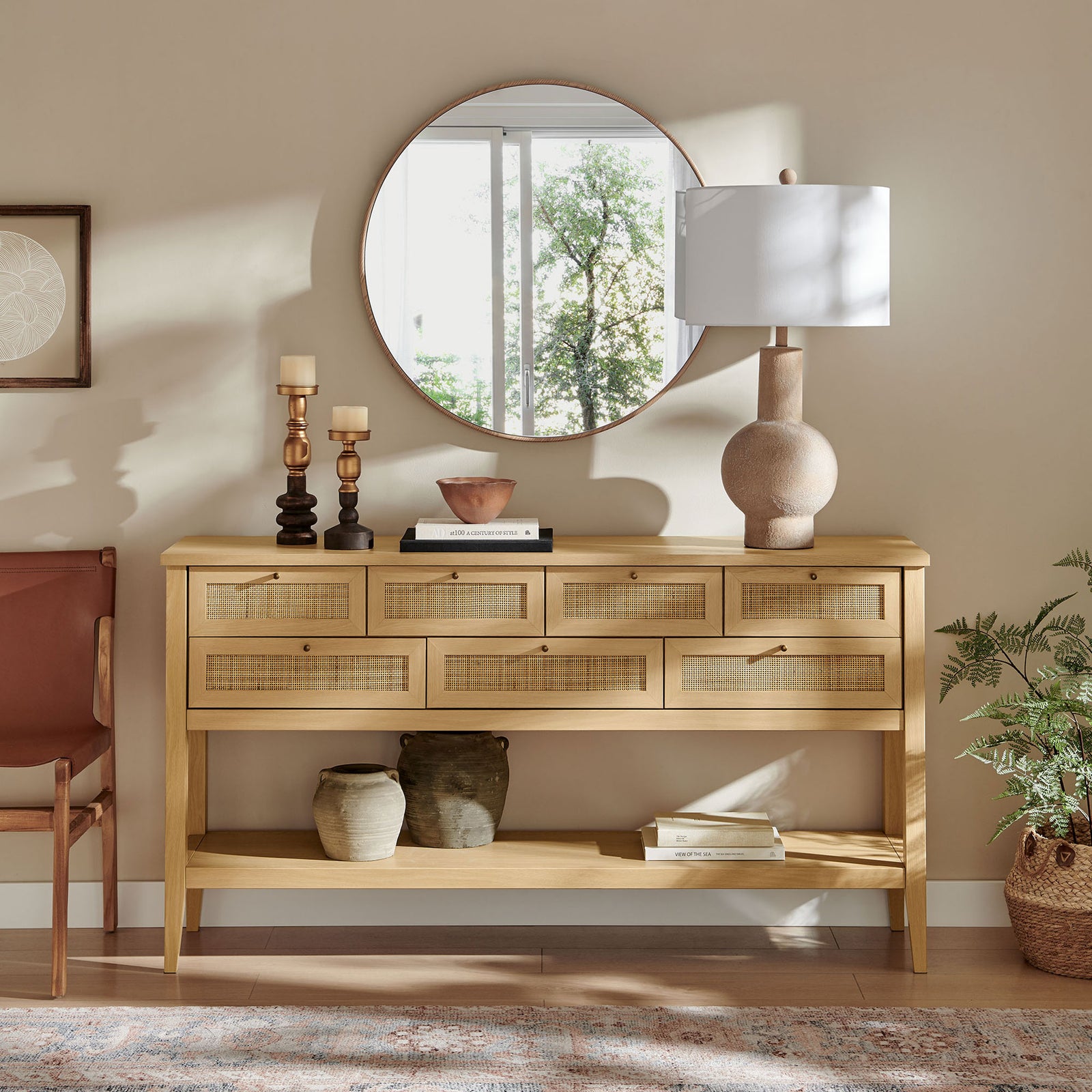 Versatile oak console elevates an entry or living room with rattan drawers and a full-length shelf || EEI-7435-OAK || front_room