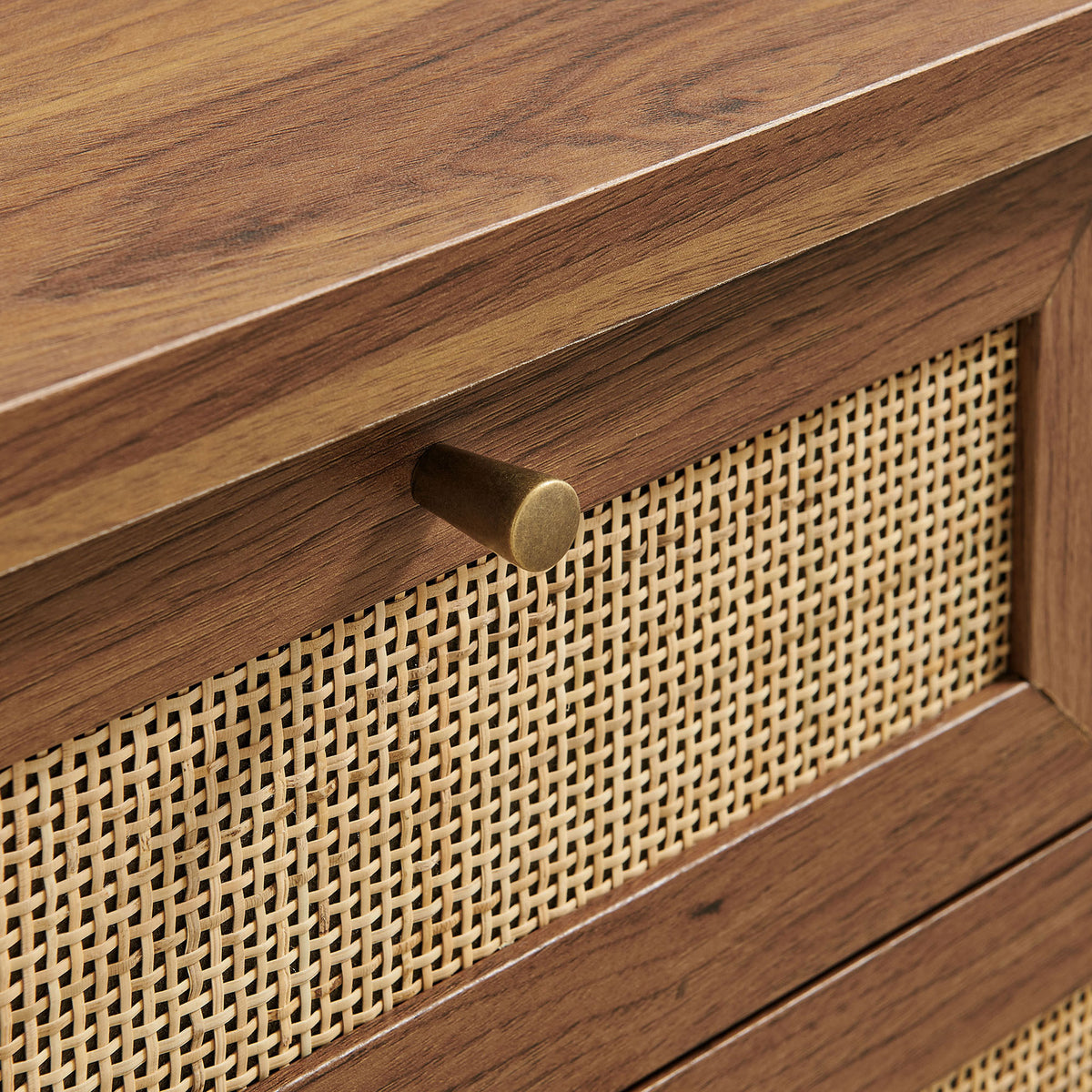 Brushed brass knob and cane-style rattan weave framed by rich walnut wood grain || EEI-7435-WAL || handle_studio