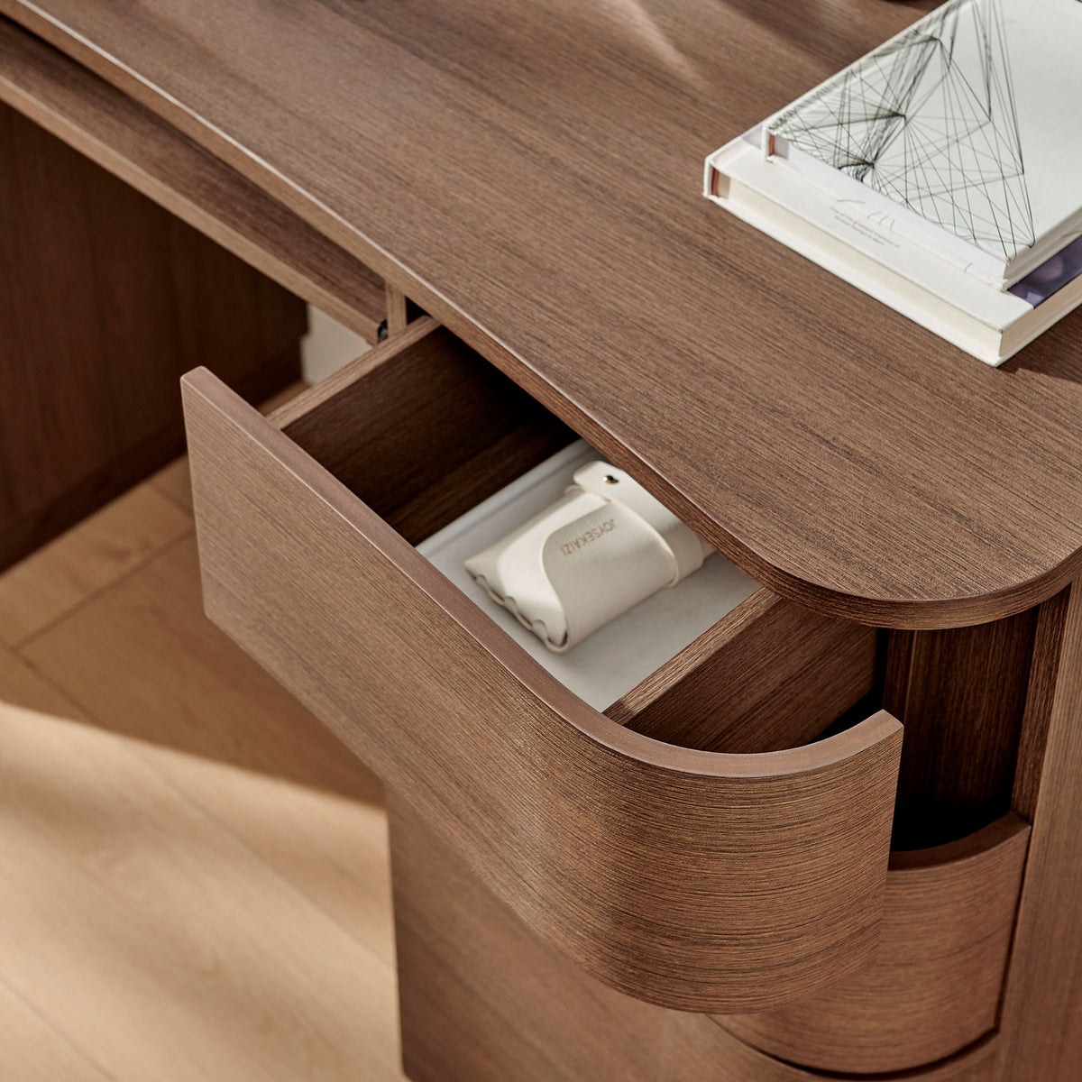 Rounded drawer reveals roomy interior for neatly storing accessories and office essentials. || EEI-7436-BBO || storage_open_room