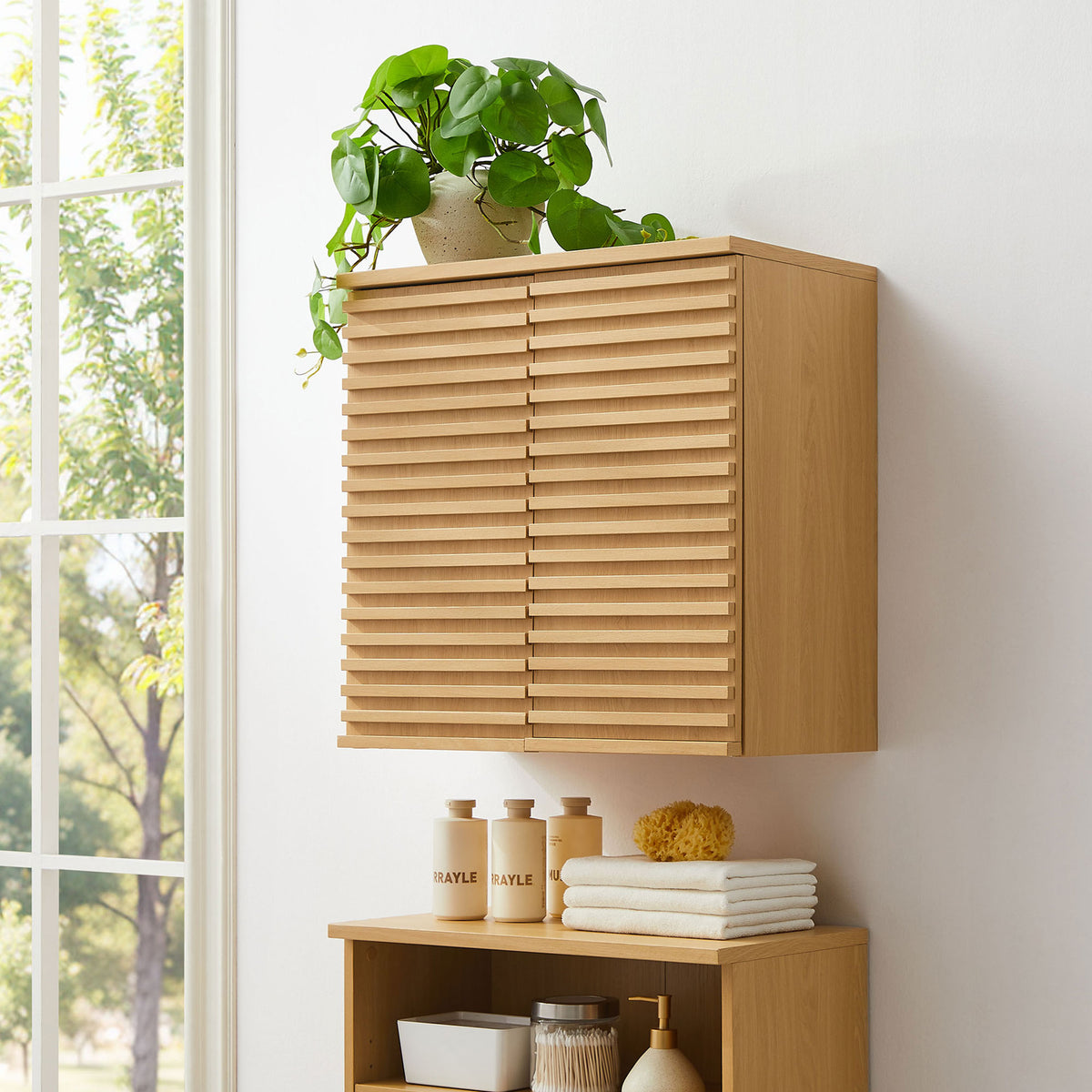 Sleek oak wall cabinet brings mid-century charm and extra storage to your space || EEI-7438-OAK || front_angle_room