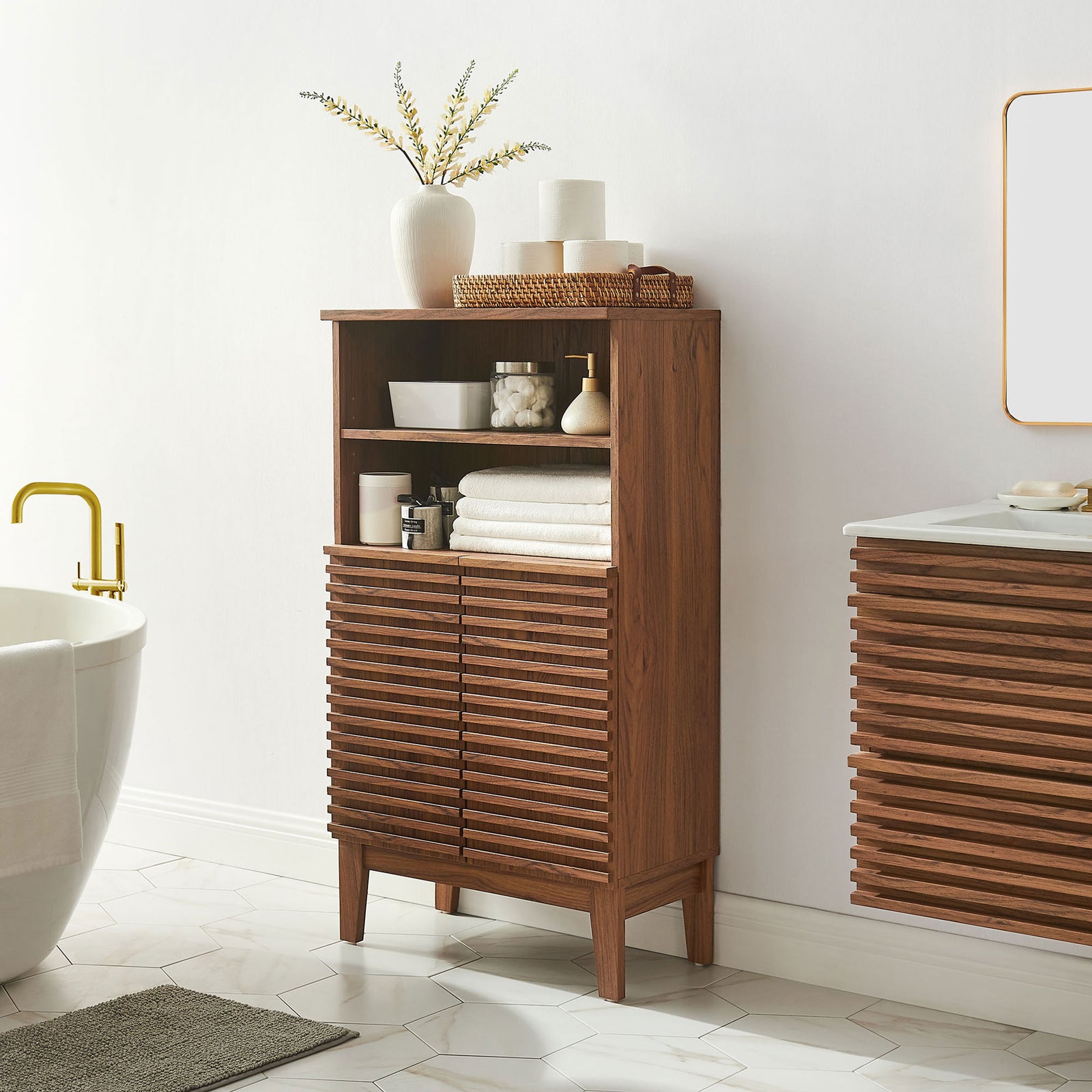 Freestanding walnut storage cabinet styled in a modern bath with open shelves and slatted doors || EEI-7439-WAL || front_angle_room