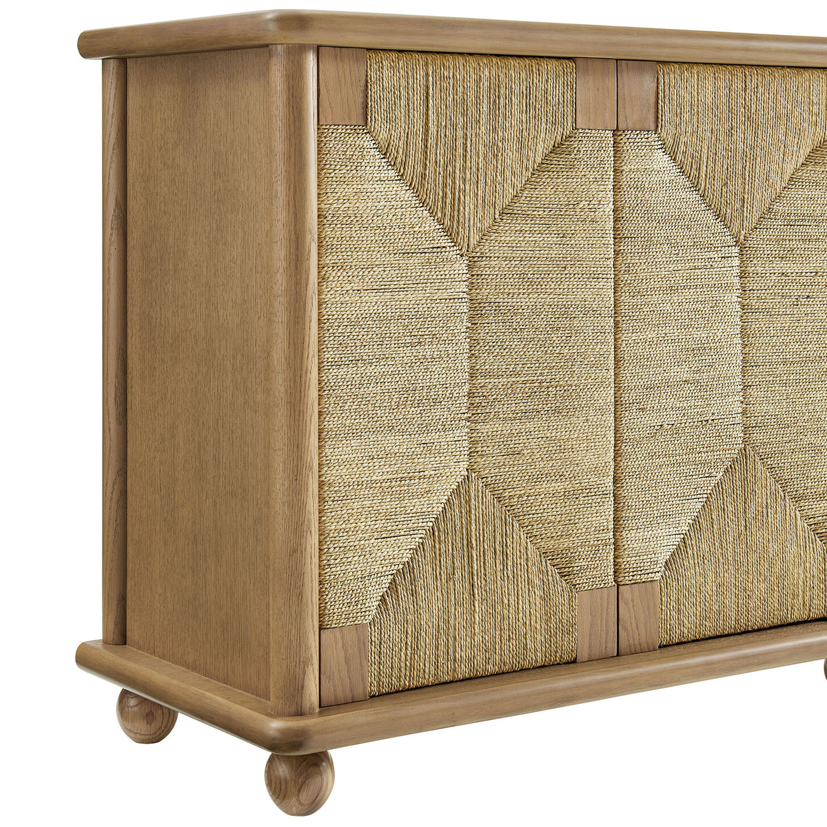 Textured woven seagrass doors framed by warm oak wood and grounded on rounded ball feet || EEI-7451-OAK || detail_studio