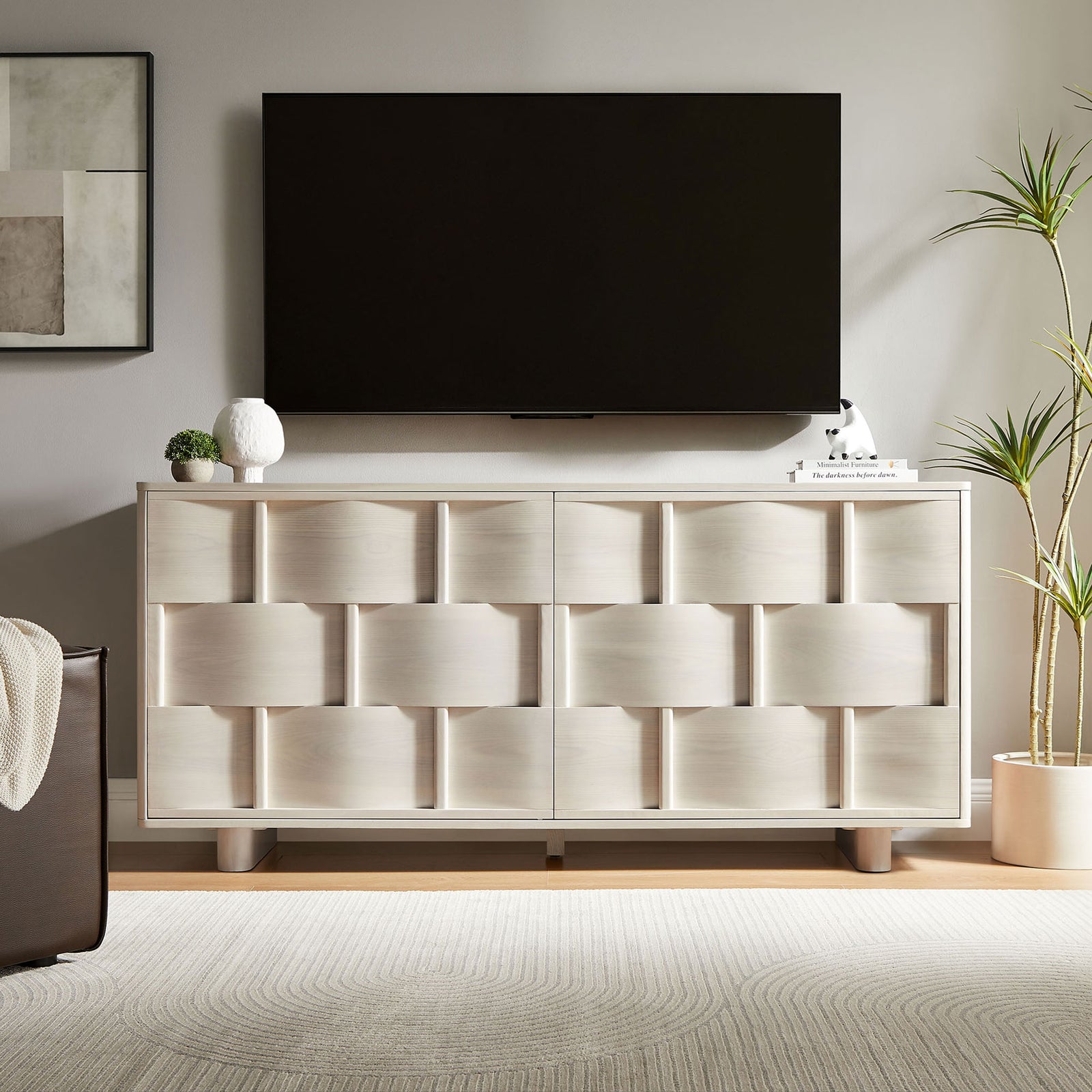 White-wash buffet cabinet used as a media console beneath a wall-mounted TV in a bright living space || EEI-7452-WWA || front_room