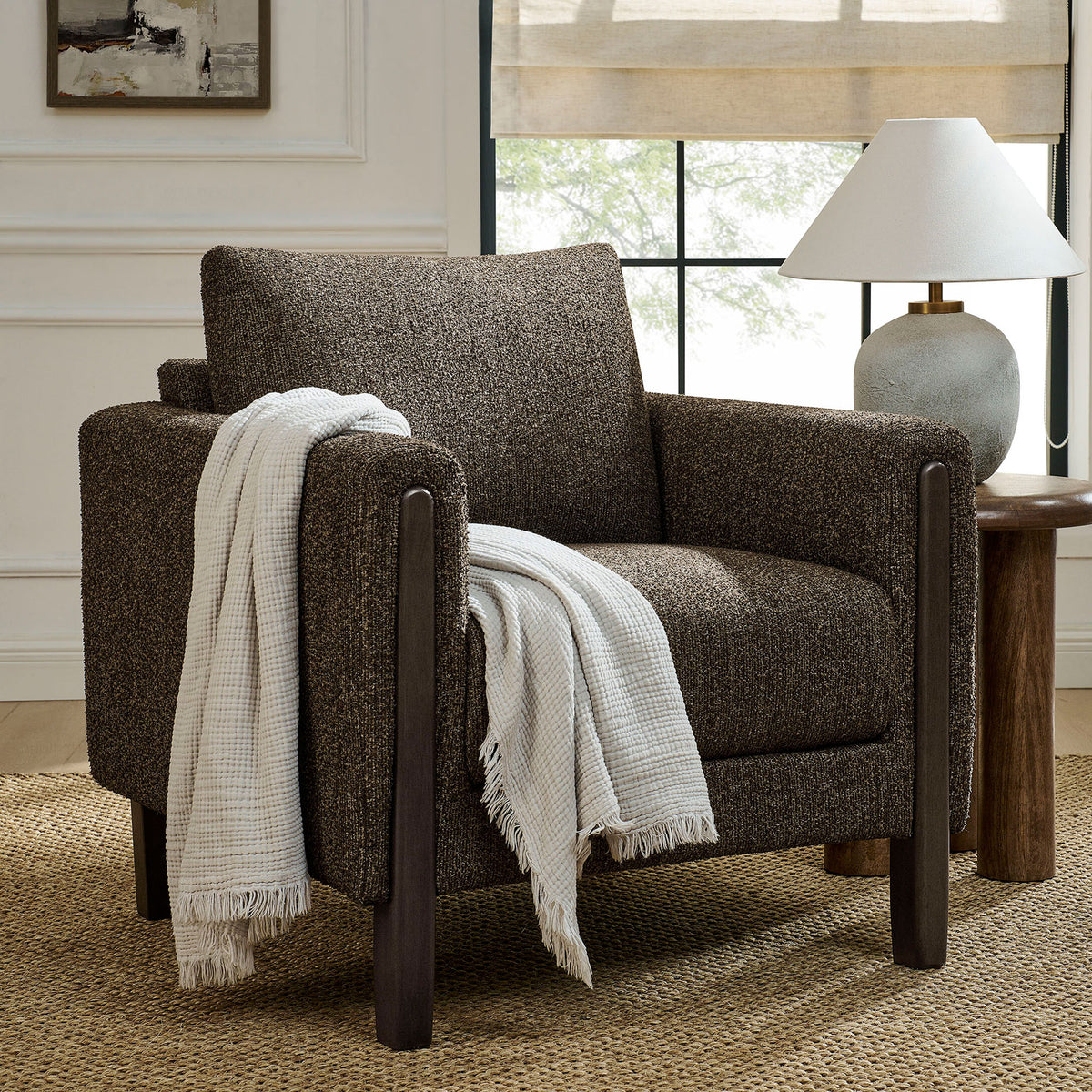 Lounge-ready accent chair adds rich texture and warm wood to elevate any living space. || EEI-7459-ATQ-ESP || front_angle_room